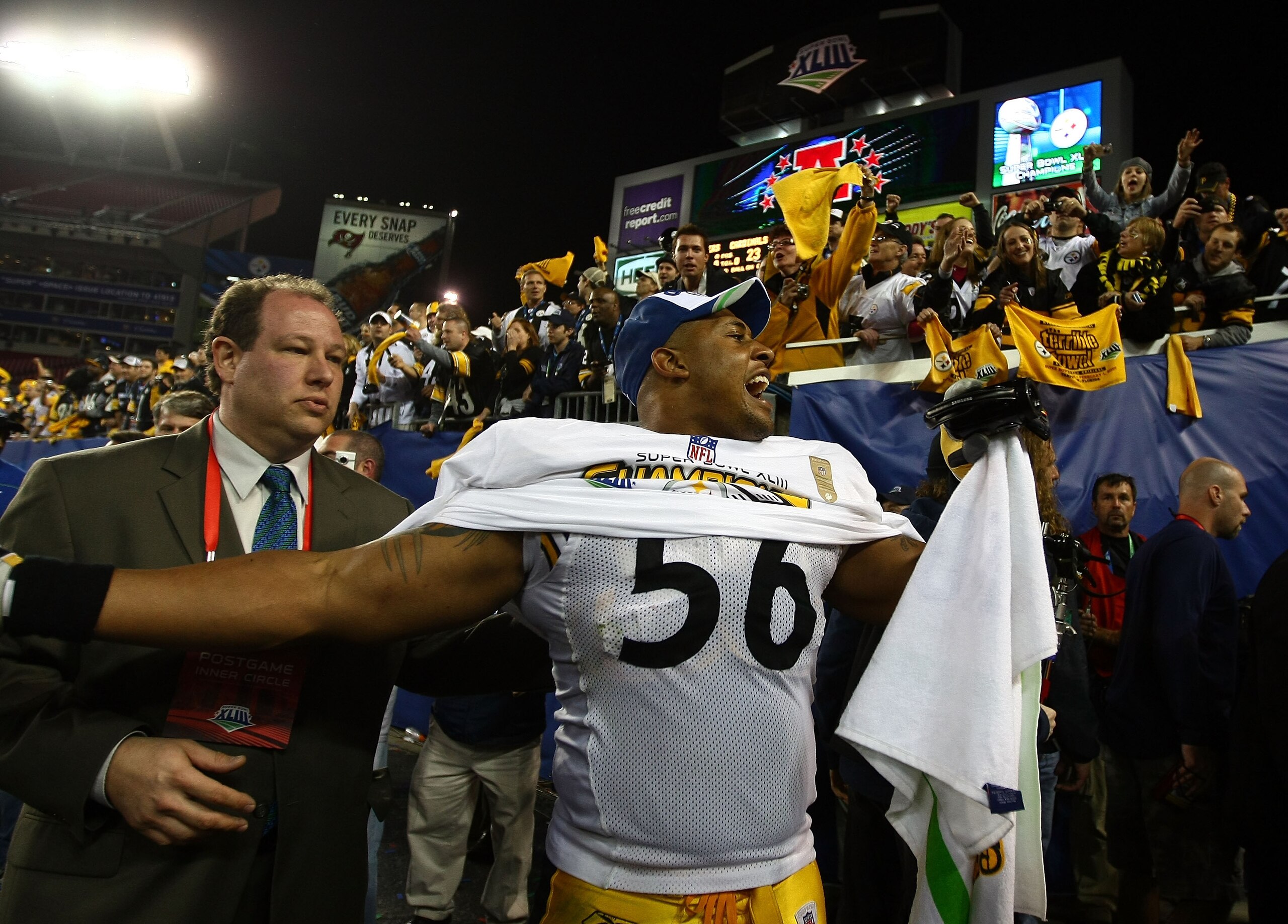 TAMPA, FL - FEBRUARY 01:  LaMarr Woodley #56 of the Pittsburgh Steelers celebrates with the fans after their 27-23 win against the Arizona Cardinals during Super Bowl XLIII on February 1, 2009 at Raymond James Stadium in Tampa, Florida.  (Photo by Chris M