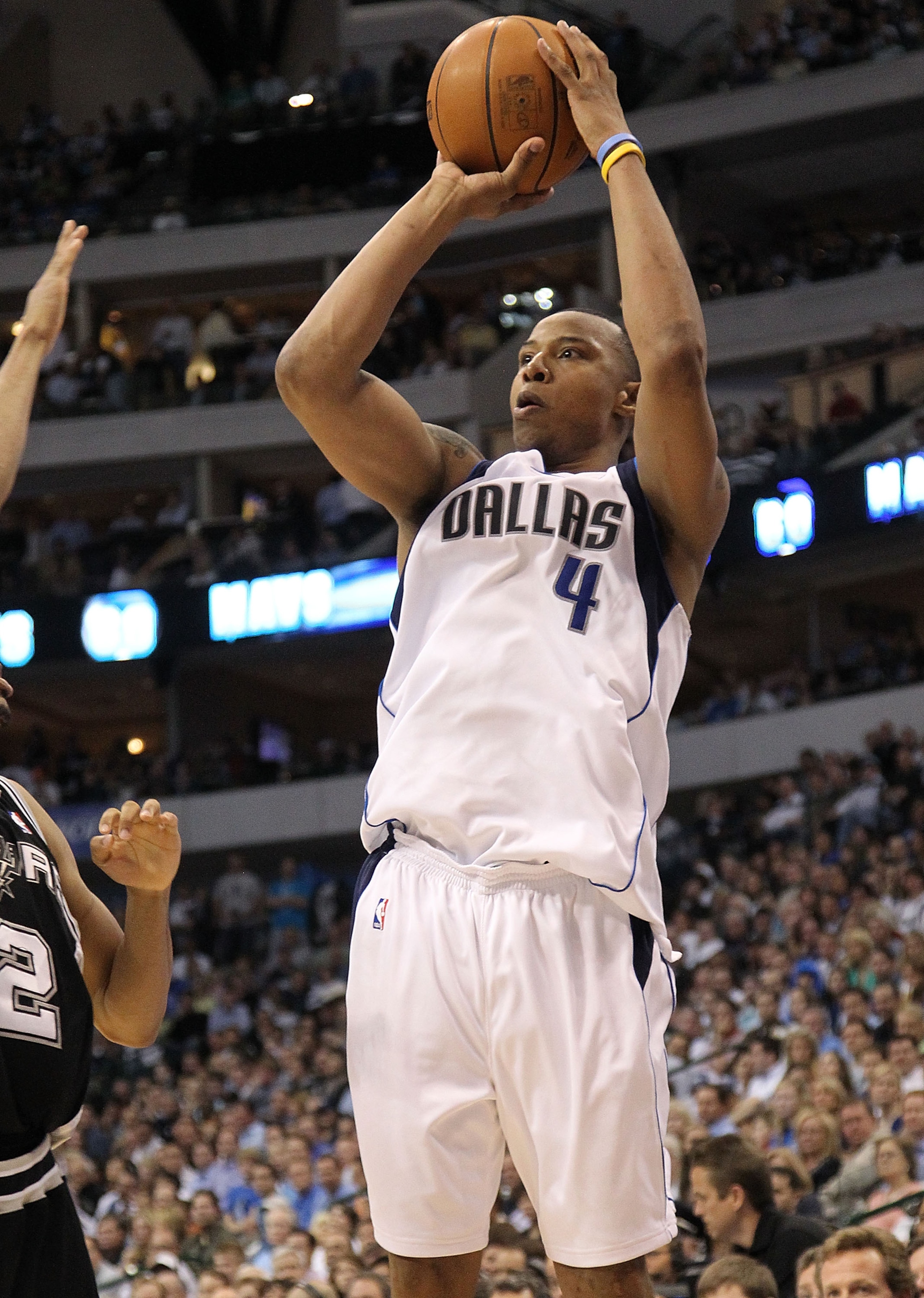 DALLAS - APRIL 27:  Forward Caron Butler #4 of the Dallas Mavericks takes a shot against the San Antonio Spurs in Game Five of the Western Conference Quarterfinals during the 2010 NBA Playoffs at American Airlines Center on April 27, 2010 in Dallas, Texas