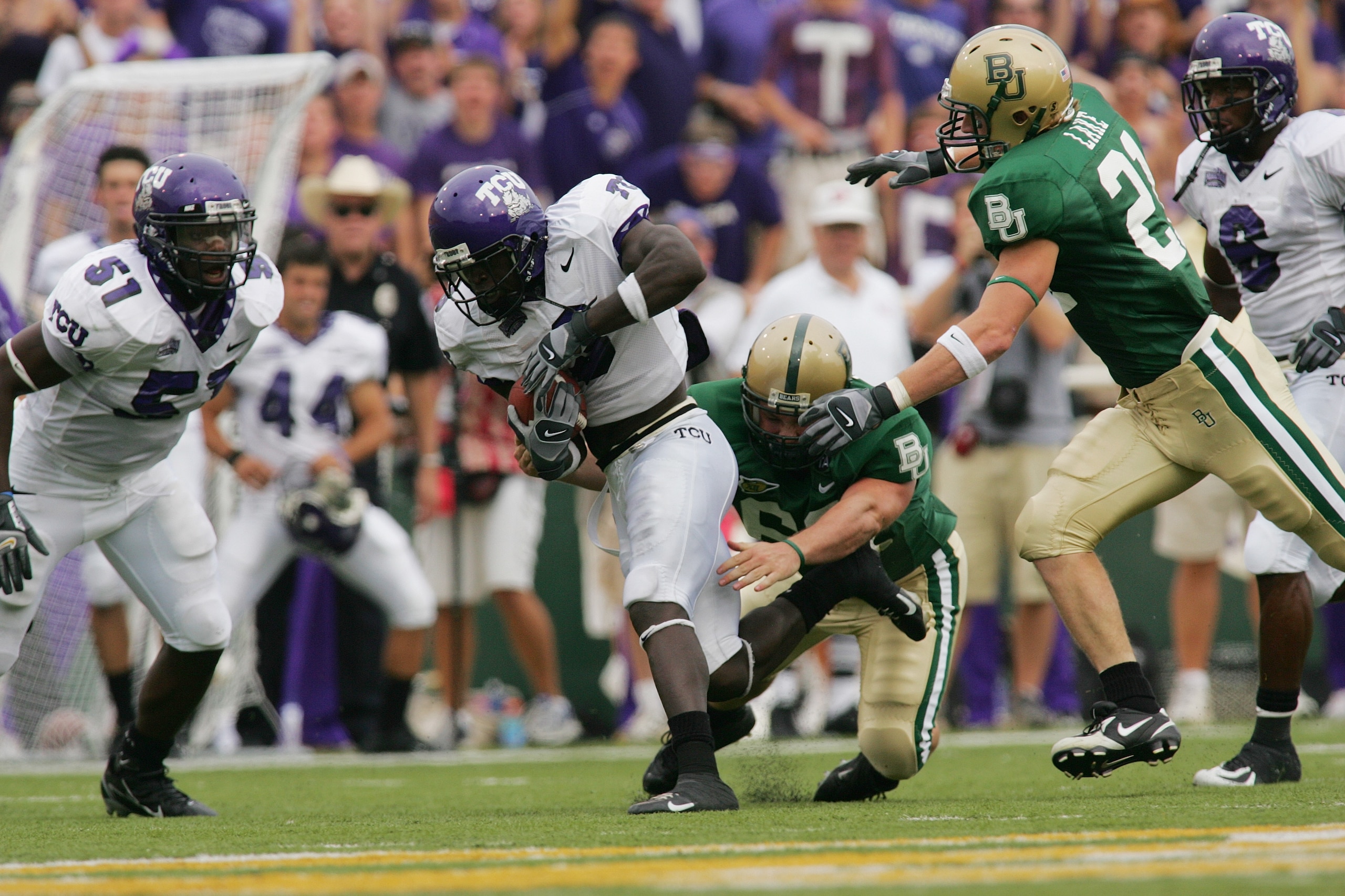 WACO, TX - SEPTEMBER 3:  Wide receiver Marcus Brock #3 of the TCU Horned Frogs runs with the ball during the game against the Baylor Bears on September 3, 2006 at Floyd Casey Stadium in Waco, Texas. TCU defeated Baylor 17-7.  (Photo by Ronald Martinez/Get