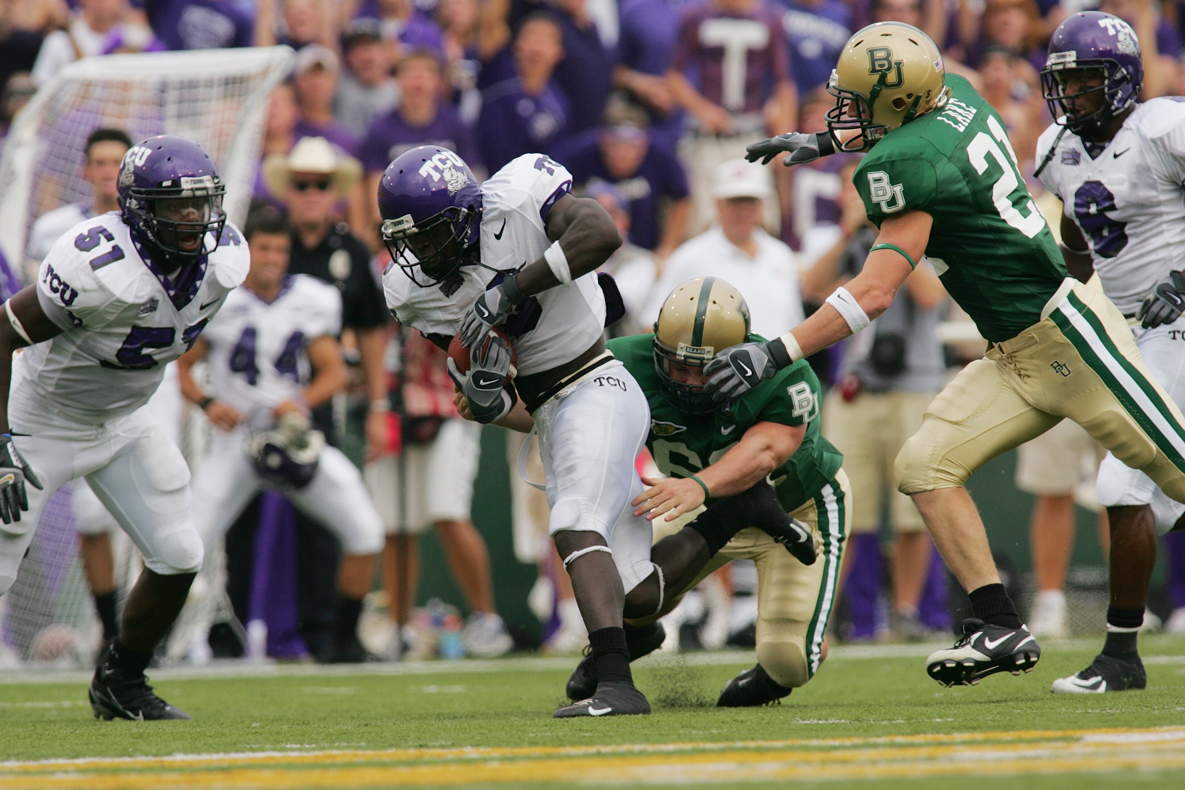 WACO, TX - SEPTEMBER 3:  Wide receiver Marcus Brock #3 of the TCU Horned Frogs runs with the ball during the game against the Baylor Bears on September 3, 2006 at Floyd Casey Stadium in Waco, Texas. TCU defeated Baylor 17-7.  (Photo by Ronald Martinez/Get