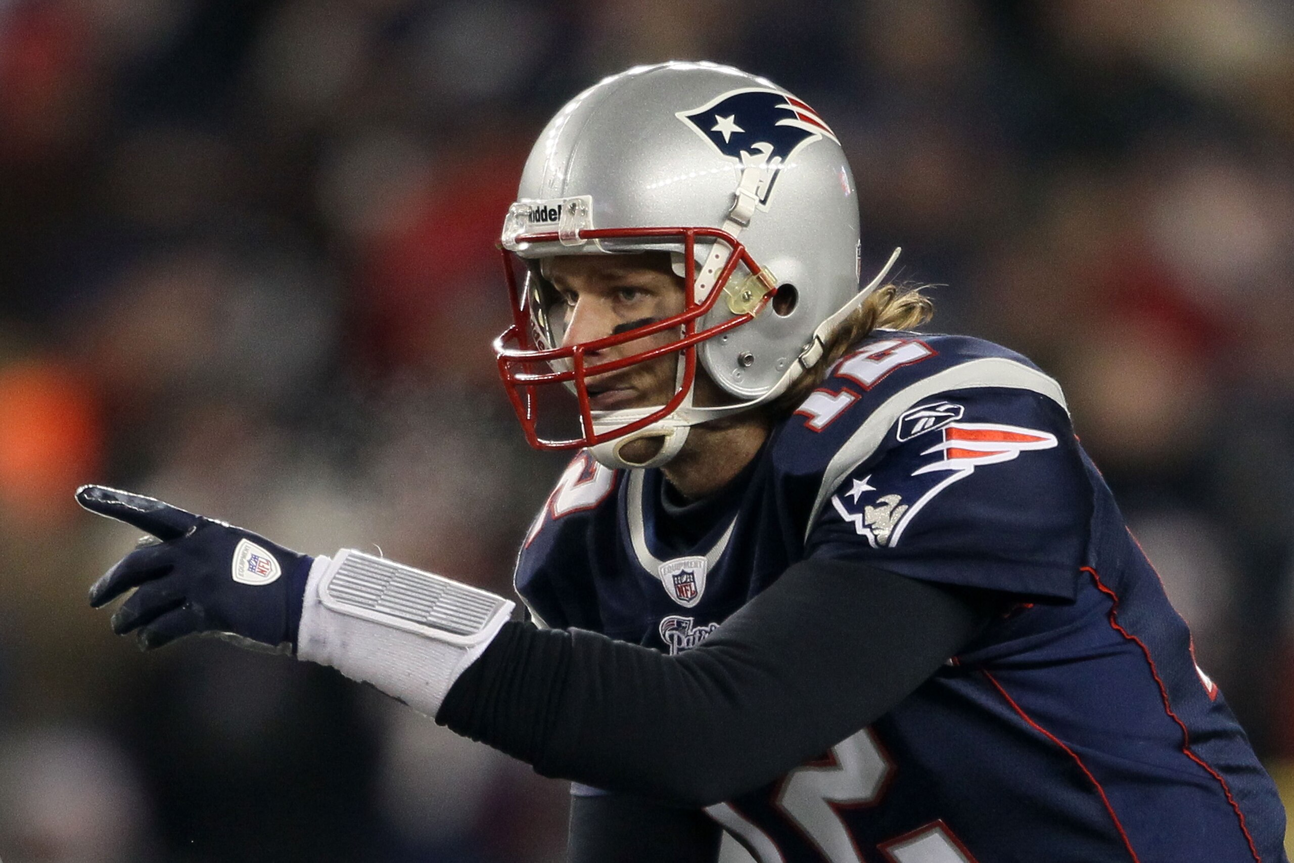 FOXBORO, MA - DECEMBER 19:  Quarterback Tom Brady #12 of the New England Patriots communicates with teammates during the game against the Green Bay Packers at Gillette Stadium on December 19, 2010 in Foxboro, Massachusetts. The Patriots won the game 31-27
