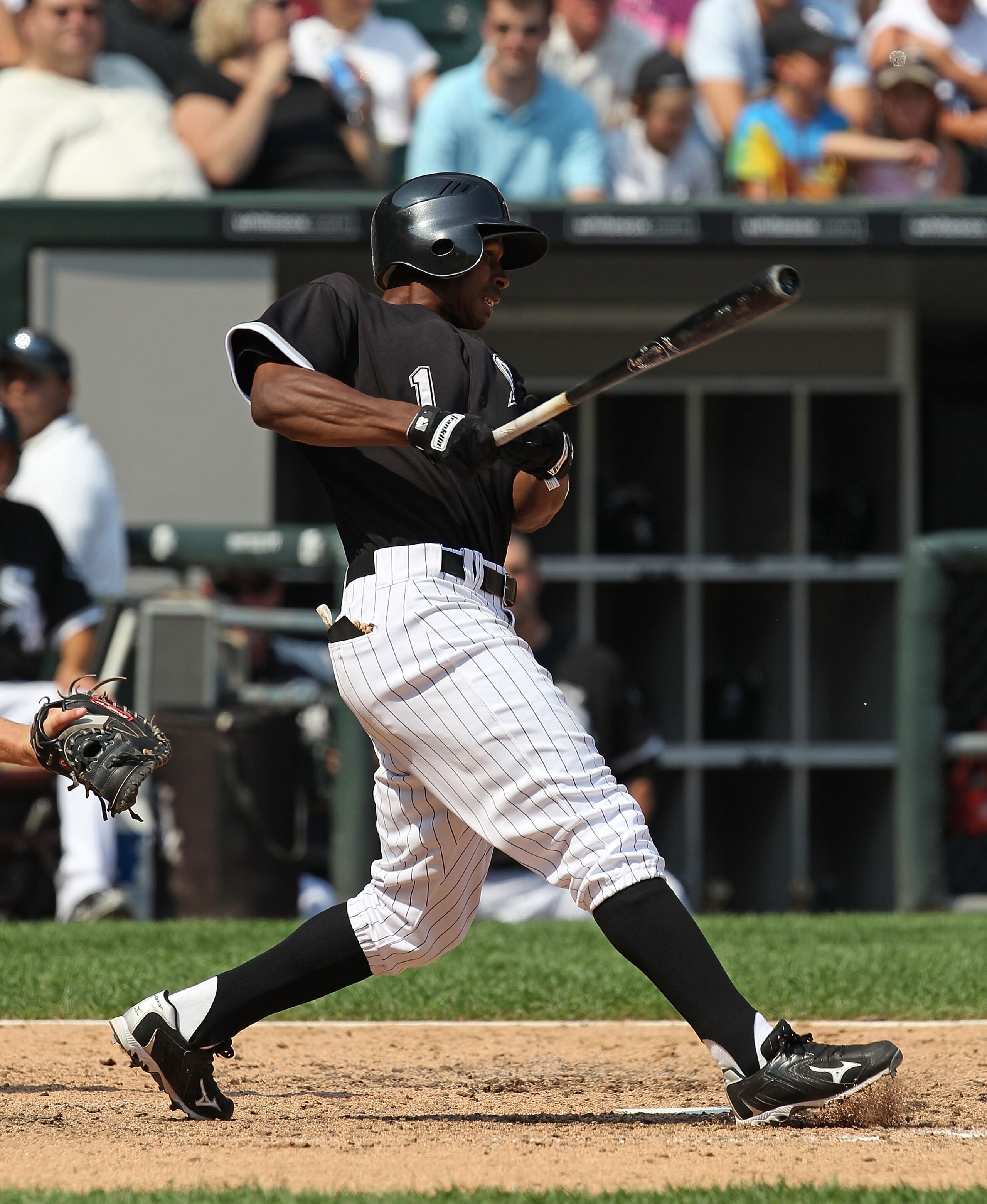 CHICAGO - AUGUST 01: Juan Pierre #1 of the Chicago White Sox hits the ball against the Oakland Athletics at U.S. Cellular Field on August 1, 2010 in Chicago, Illinois. The White Sox defeated the Athletics 4-1. (Photo by Jonathan Daniel/Getty Images)