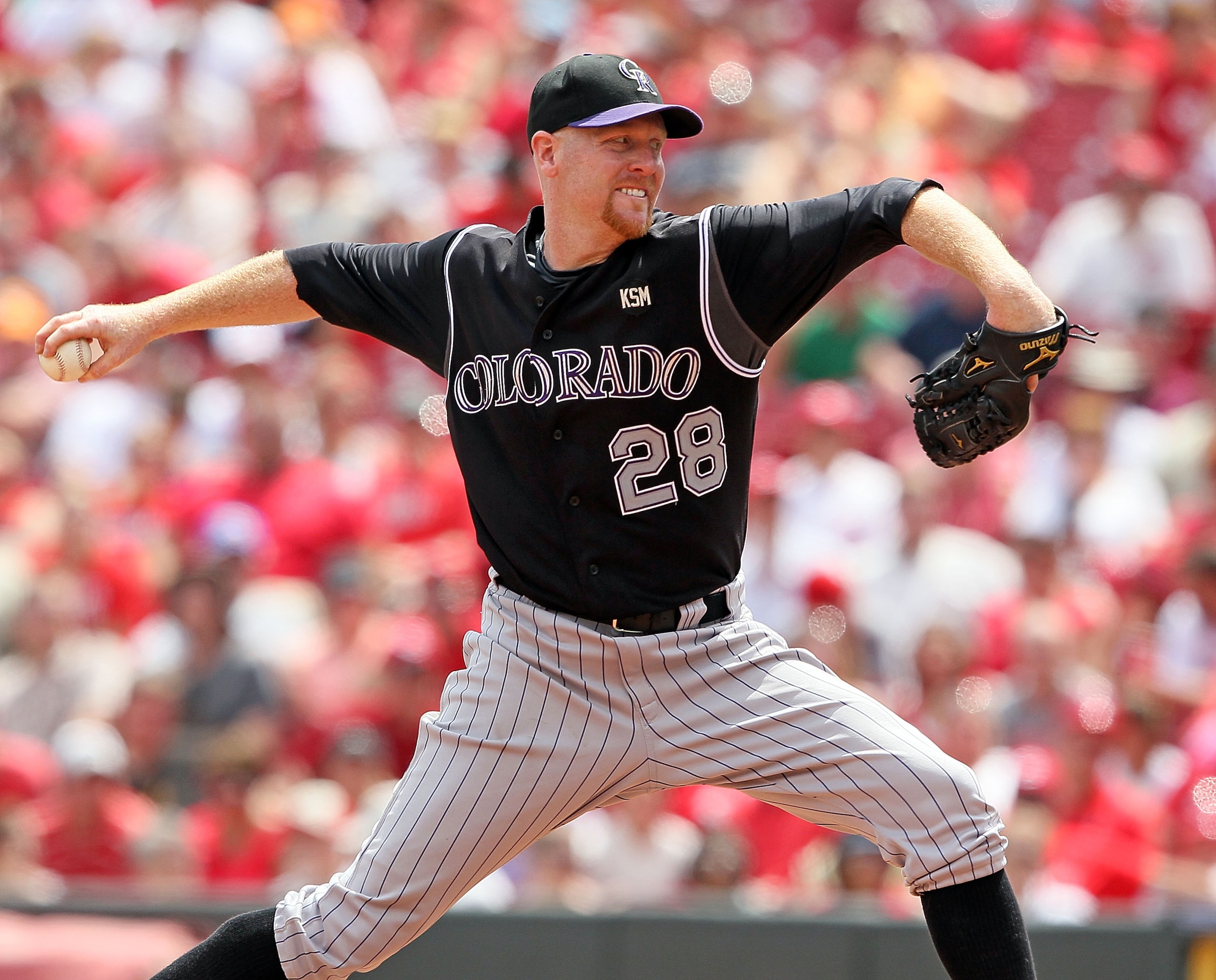 CINCINNATI - JULY 18:  Aaron Cook #28 of the Colorado Rockies throws a pitch during the game against the Cincinnati Reds at Great American Ball Park on July 18, 2010 in Cincinnati, Ohio.  (Photo by Andy Lyons/Getty Images)
