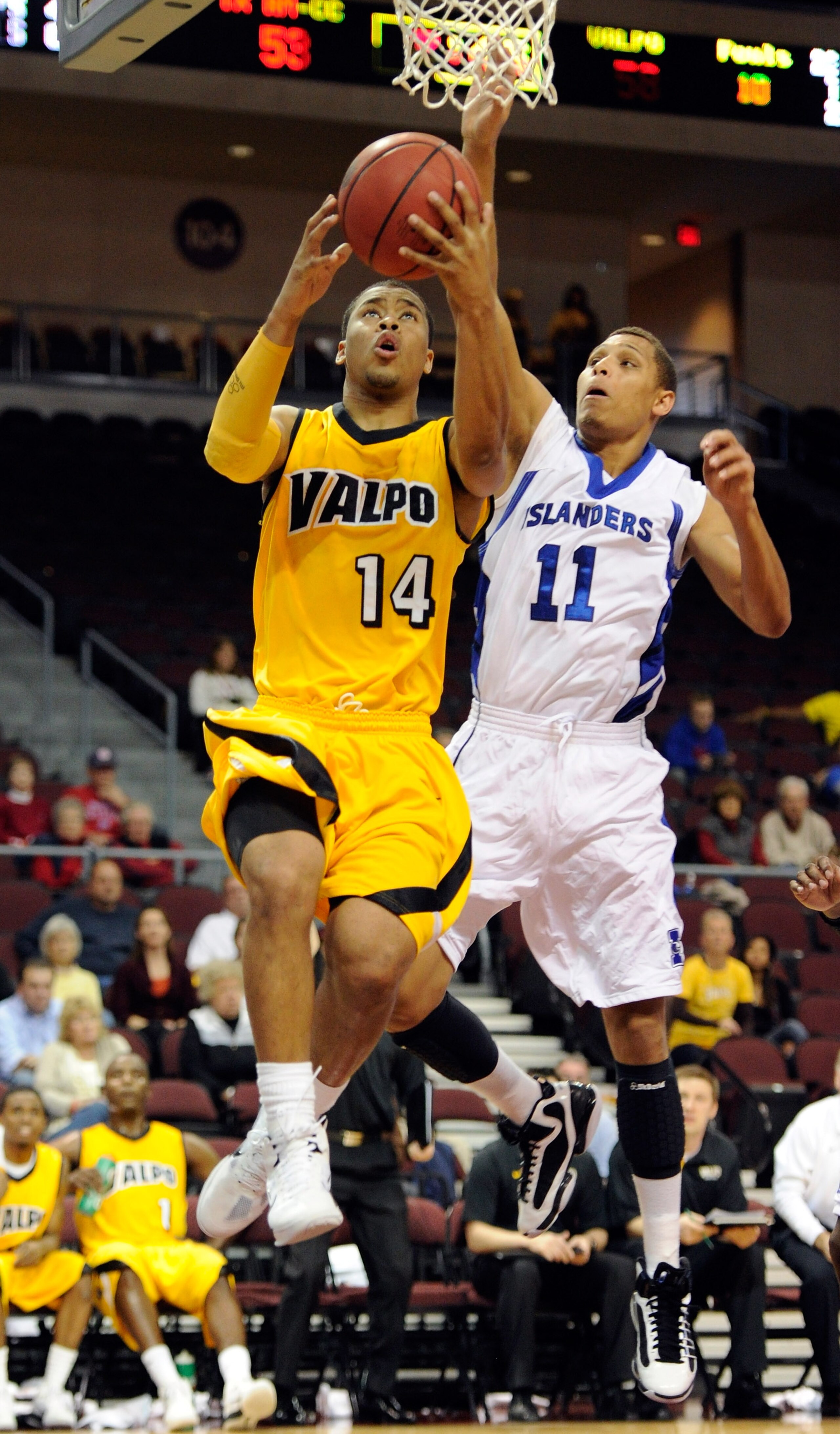 LAS VEGAS - NOVEMBER 27: Howard Little #14 of the Valparaiso Crusaders shoots as Chris Mast #11 of the Texas A&M-Corpus Christi Islanders defends during the fourth round of the Las Vegas Invitational at The Orleans Arena November 27, 2010 in Las Vegas, N LAS VEGAS - NOVEMBER 27: Howard Little #14 of the Valparaiso Crusaders shoots as Chris Mast #11 of the Texas A&M-Corpus Christi Islanders defends during the fourth round of the Las Vegas Invitational at The Orleans Arena November 27, 2010 in Las Vegas, N