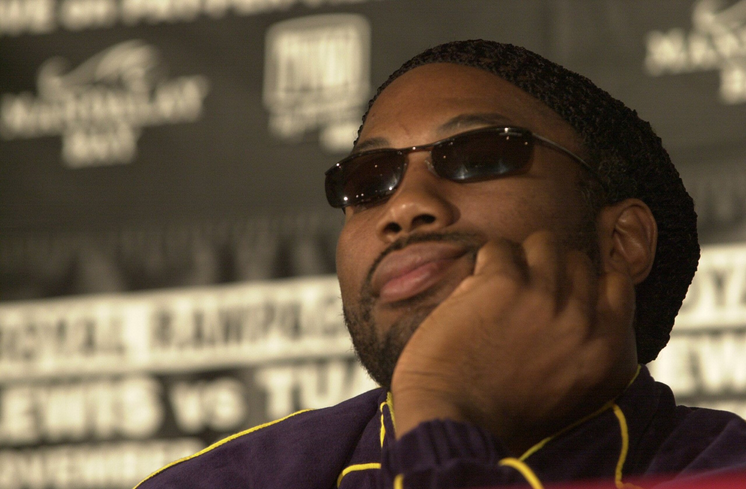 8 Nov 2000:  Lennox Lewis appears bored during the press conference for his fight against David Tua at the Mandalay Bay Resort and Casino in Las Vegas, Nevada. Mandatory Credit: John Gichigi/ALLSPORT
