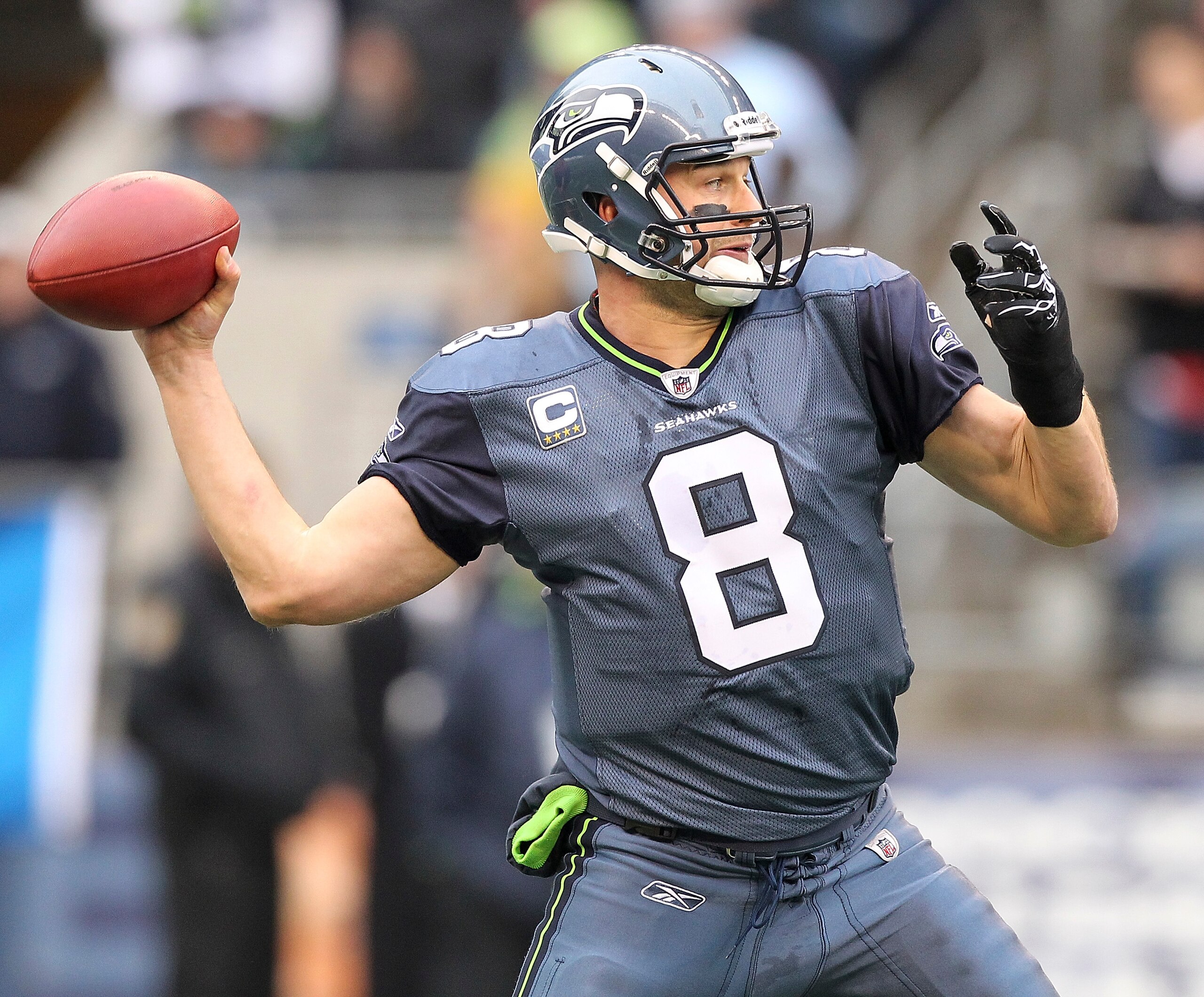 SEATTLE, WA - DECEMBER 05:  Quarterback Matt Hasselbeck #8 of the Seattle Seahawks passes against the Carolina Panthers at Qwest Field on December 5, 2010 in Seattle, Washington. The Seahawks defeated the Panthers 31-14. (Photo by Otto Greule Jr/Getty Ima