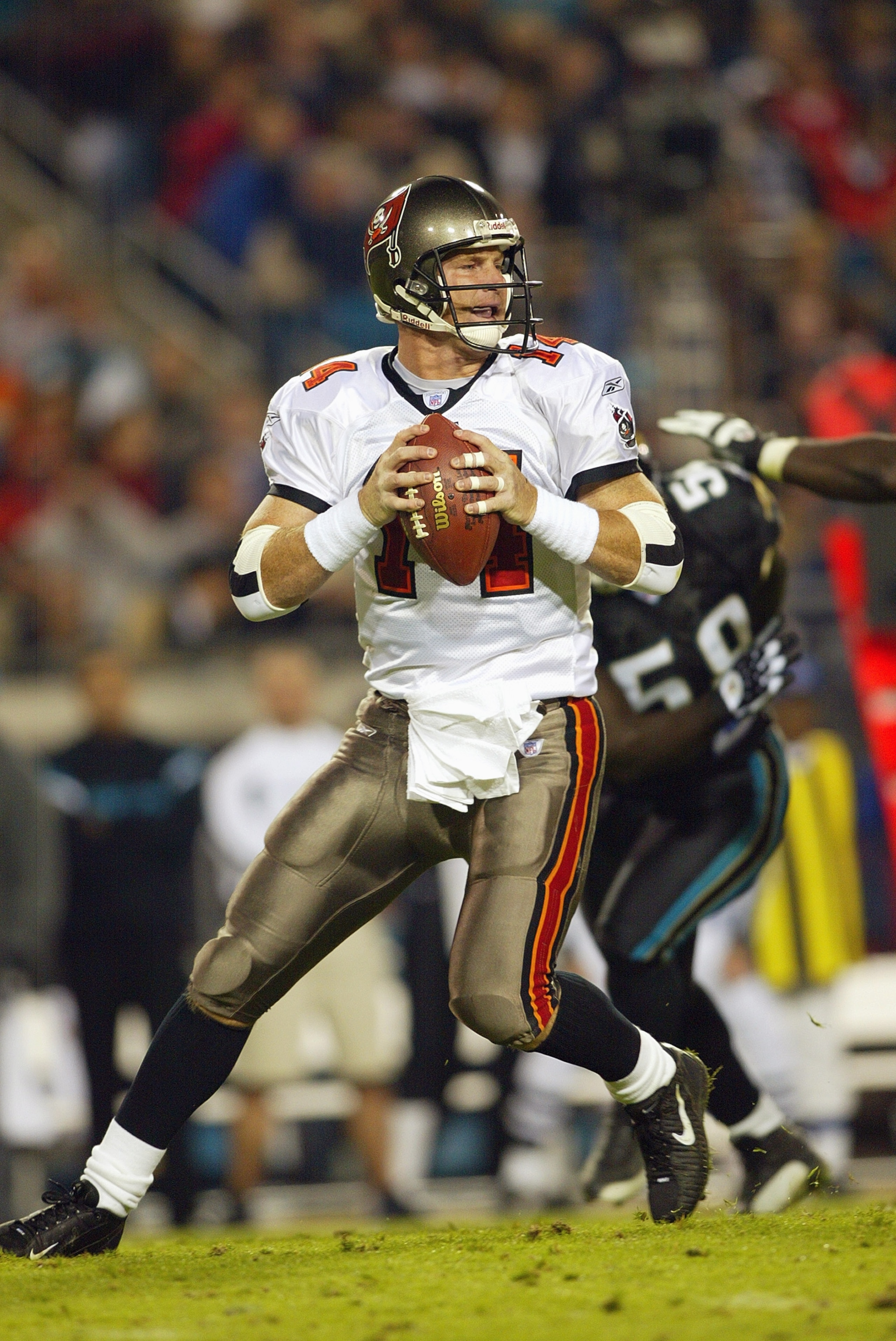 JACKSONVILLE, FL - NOVEMBER 30:  Quarterback Brad Johnson #14 of the Tampa Bay Buccaneers drops back to pass during the game against the Jacksonville Jaguars on November 30, 2003 at Alltel Stadium in Jacksonville, Florida. The Jaguars defeated the Buccane