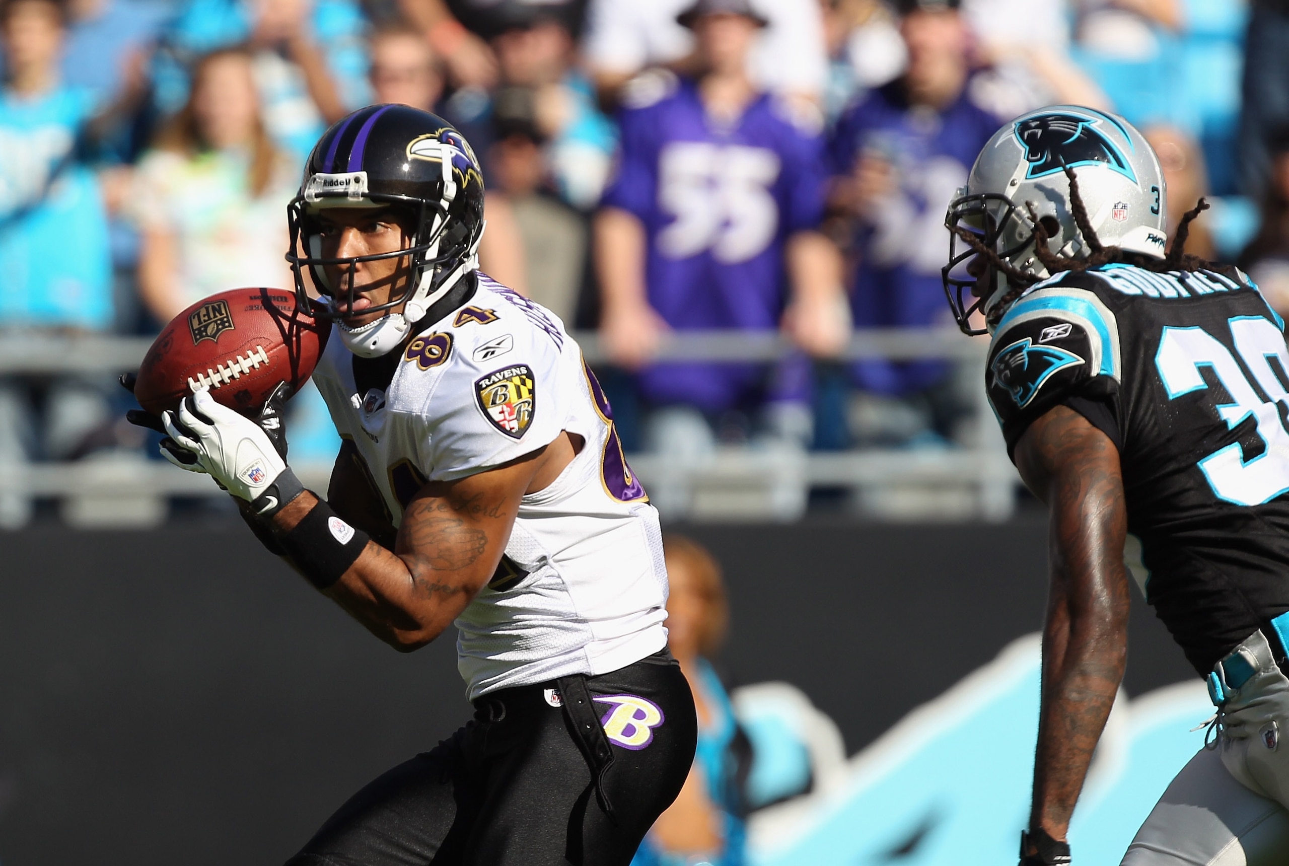 CHARLOTTE, NC - NOVEMBER 21:  T.J. Houshmandzadeh #84 of the Baltimore Ravens against the Carolina Panthers at Bank of America Stadium on November 21, 2010 in Charlotte, North Carolina.  (Photo by Streeter Lecka/Getty Images)