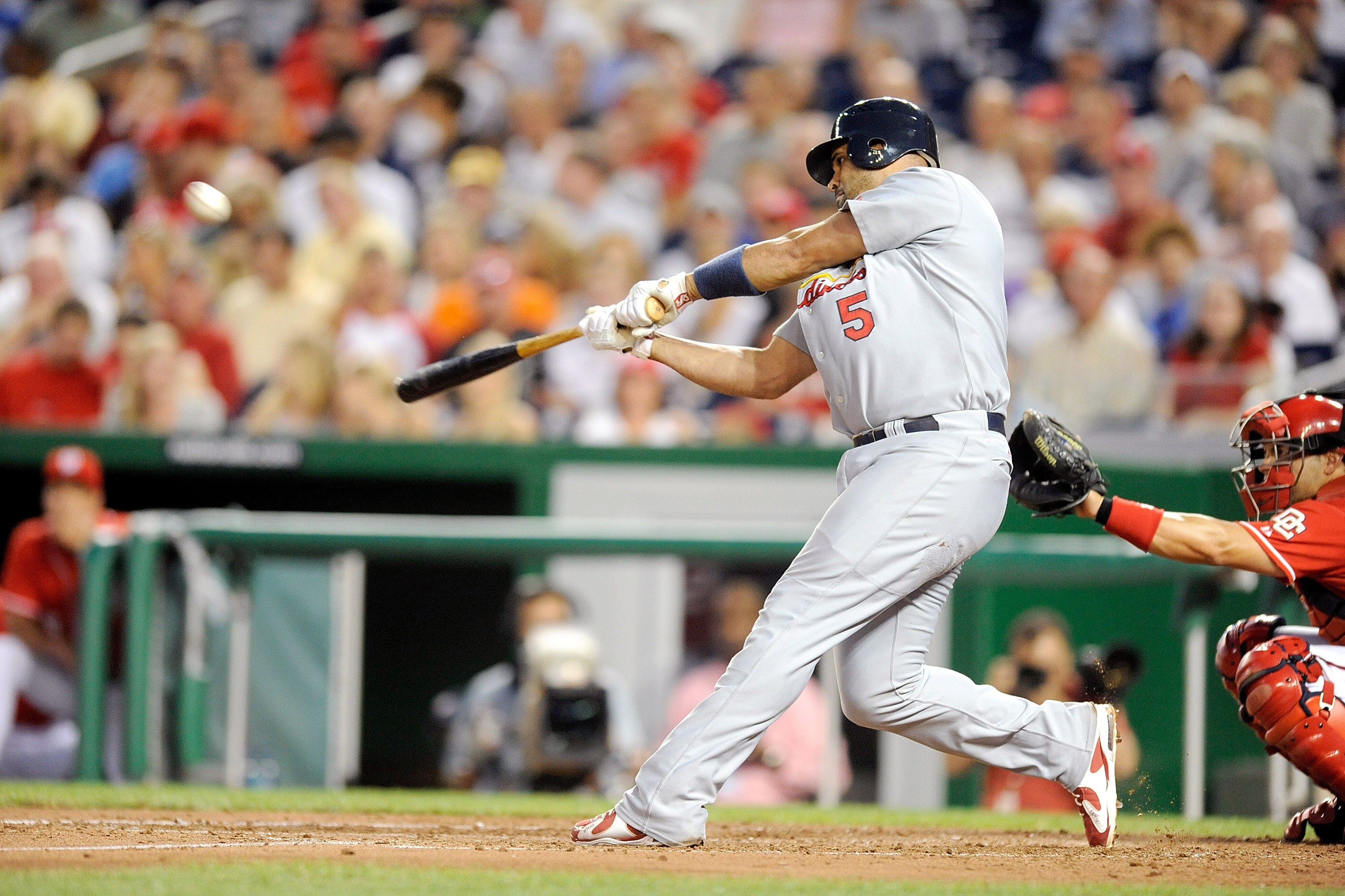 WASHINGTON - AUGUST 26: Albert Pujols #5 of the St. Louis Cardinals hits a home run in the fourth inning against the Washington Nationals at Nationals Park on August 26, 2010 in Washington, DC. It was the 400th home run of his career. (Photo by Greg Fium WASHINGTON - AUGUST 26: Albert Pujols #5 of the St. Louis Cardinals hits a home run in the fourth inning against the Washington Nationals at Nationals Park on August 26, 2010 in Washington, DC. It was the 400th home run of his career. (Photo by Greg Fium