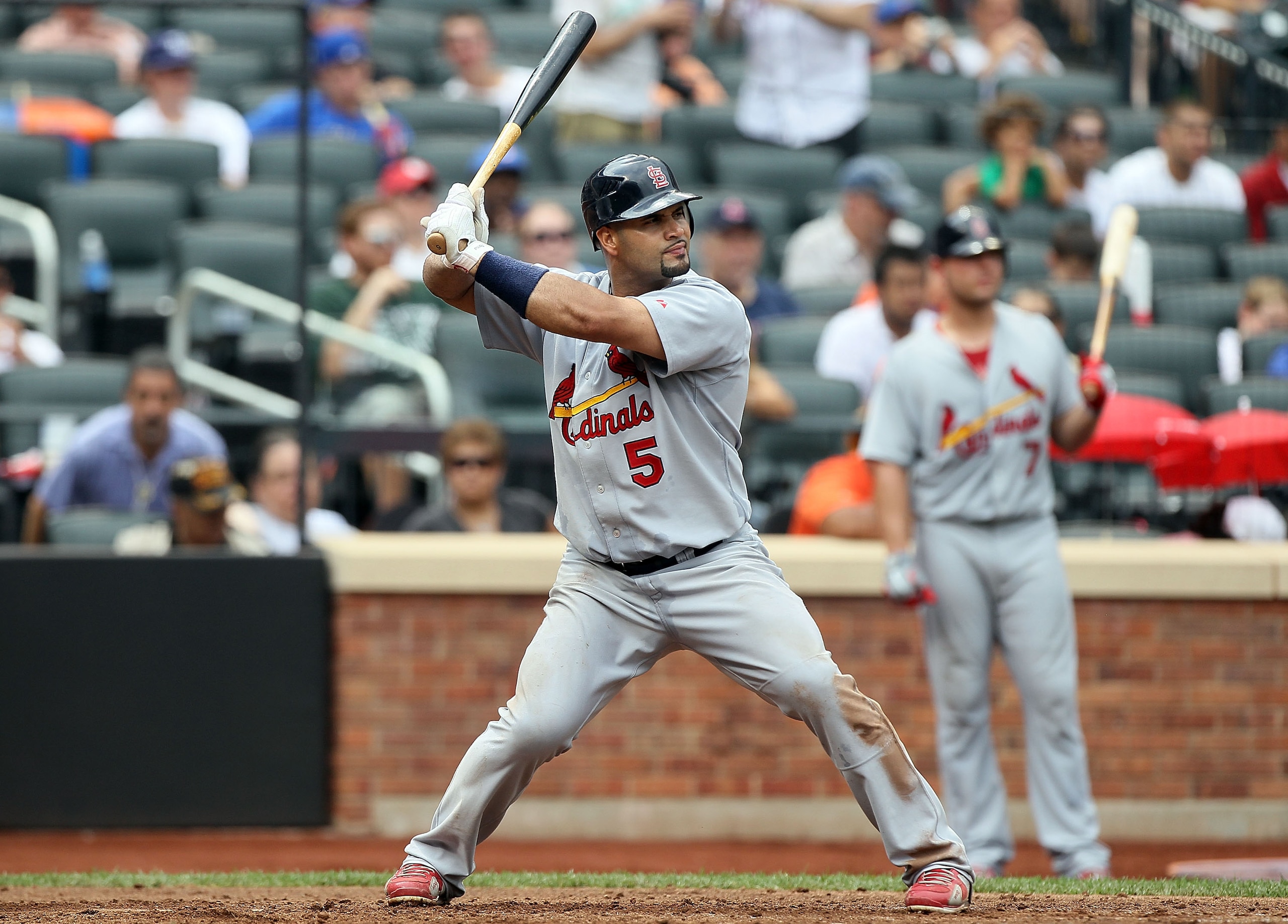 NEW YORK - JULY 29:  Albert Pujols #5 of the St. Louis Cardinals bats against the New York Mets on July 29, 2010 at Citi Field in the Flushing neighborhood of the Queens borough of New York City. The Mets defeated the Cardinals 4-0.  (Photo by Jim McIsaac