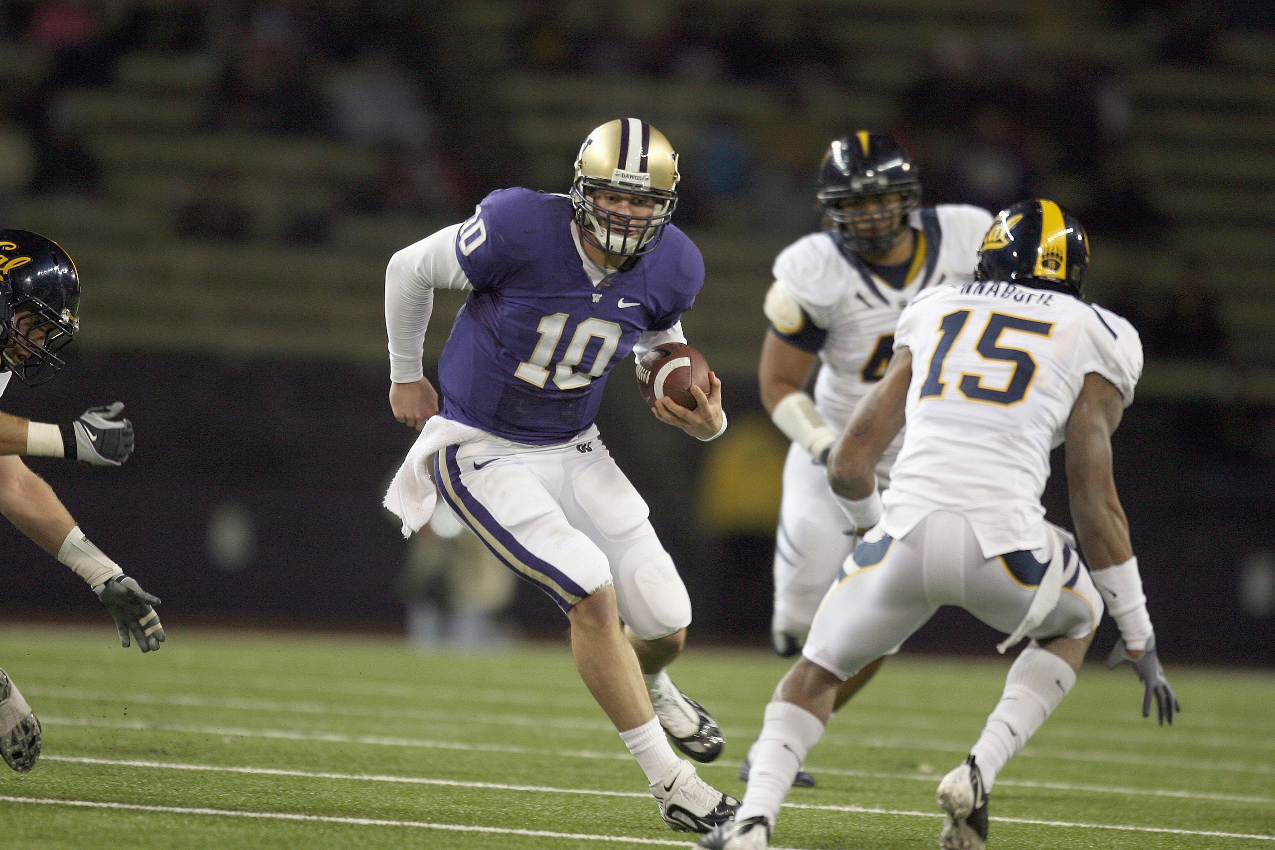 SEATTLE - DECEMBER 05:  Quarterback Jake Locker #10 of the Washington Huskies runs the ball during game against the California Bears on December 5, 2009 at Husky Stadium in Seattle, Washington. The Huskies defeated the Bears 42-10. (Photo by Otto Greule J