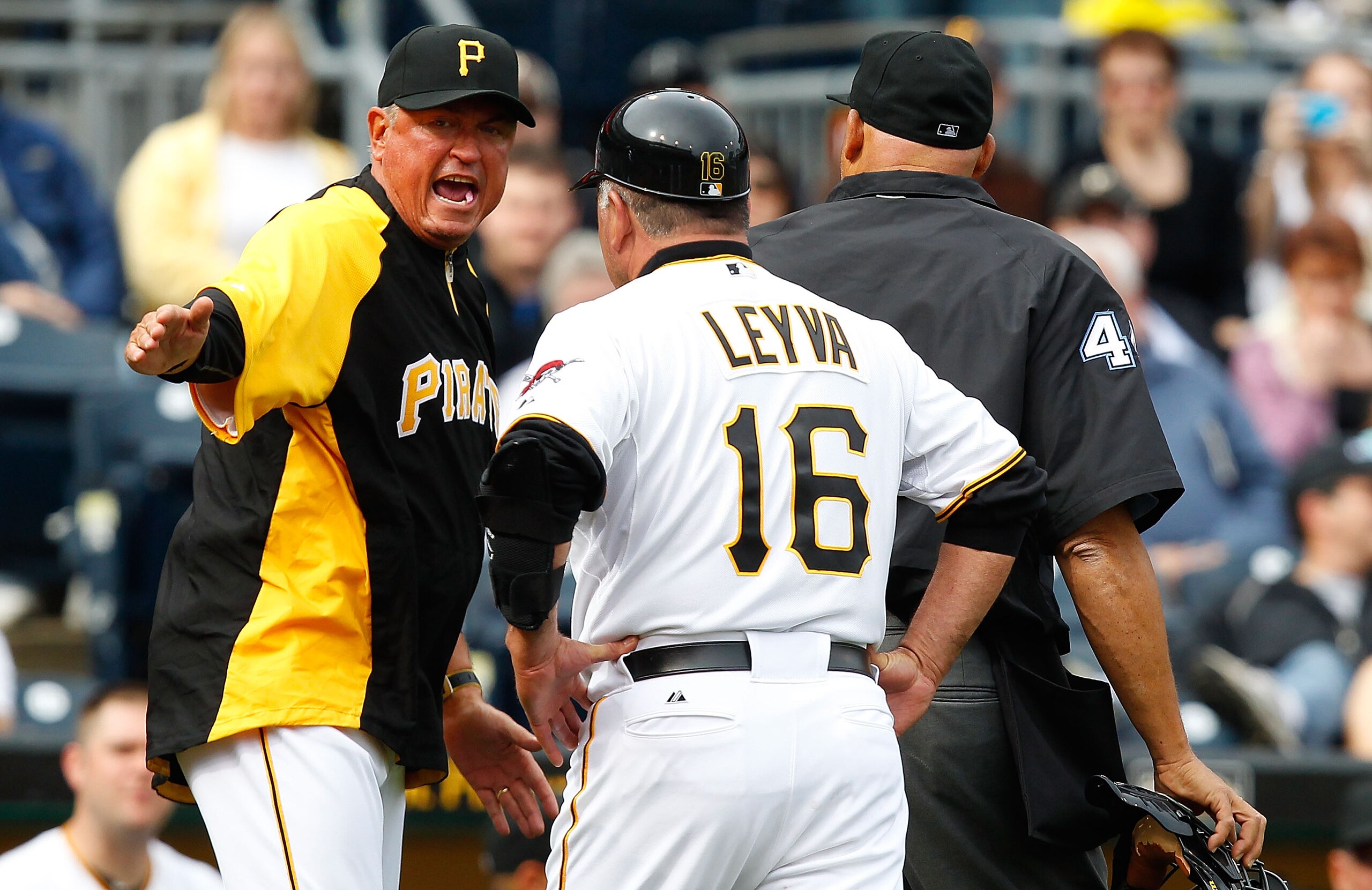 PITTSBURGH - APRIL 24: Manager Clint Hurdle #13 and third base coach Nick Leyva #16 of the Pittsburgh Pirates argue with home plate umpire on the final out of the game against the Washington Nationals during the game on April 24, 2011 at PNC Park in Pitts PITTSBURGH - APRIL 24: Manager Clint Hurdle #13 and third base coach Nick Leyva #16 of the Pittsburgh Pirates argue with home plate umpire on the final out of the game against the Washington Nationals during the game on April 24, 2011 at PNC Park in Pitts