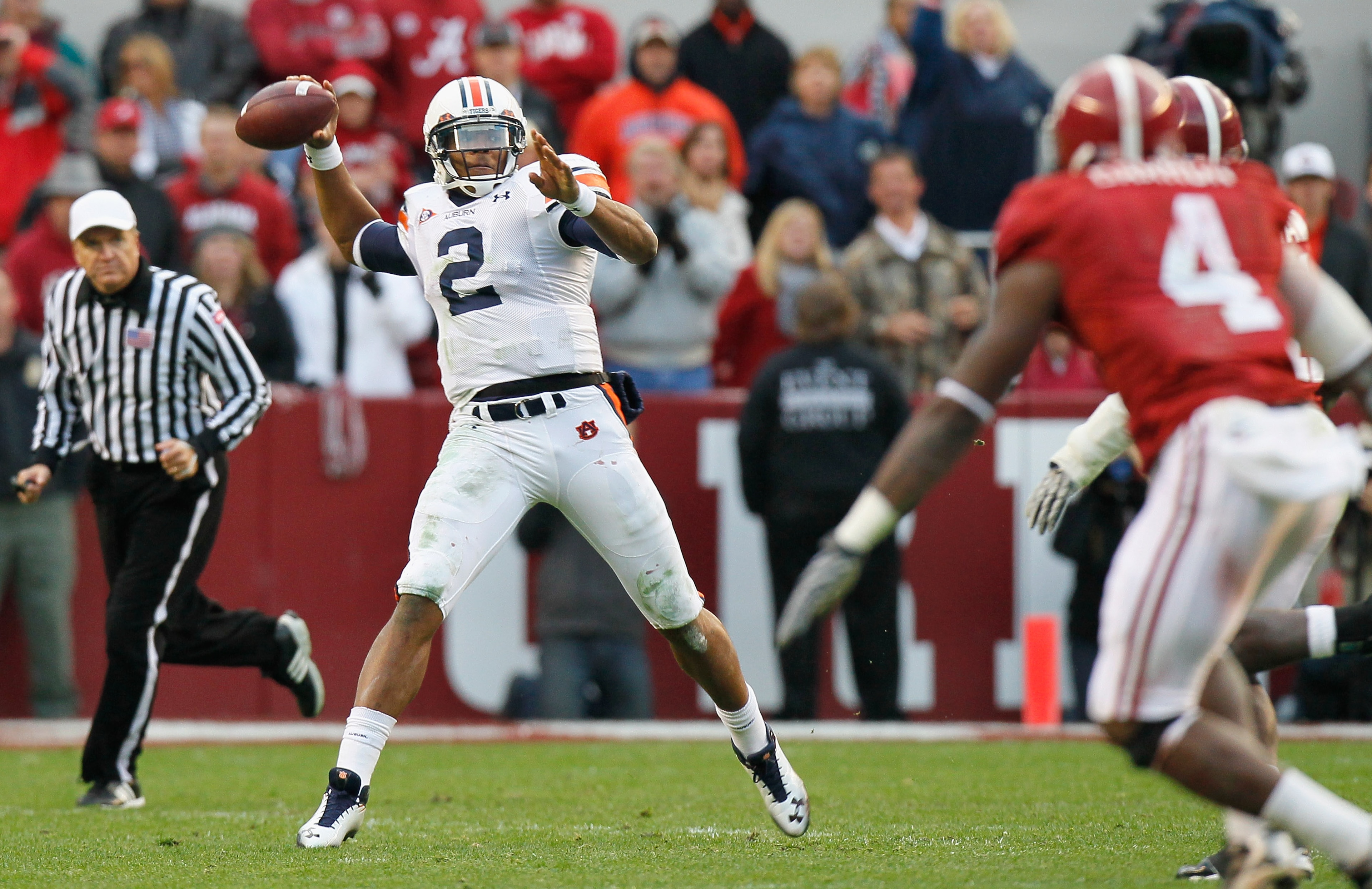 TUSCALOOSA, AL - NOVEMBER 26: Quarterback Cam Newton #2 of the Auburn Tigers looks to pass against the Alabama Crimson Tide at Bryant-Denny Stadium on November 26, 2010 in Tuscaloosa, Alabama. (Photo by Kevin C. Cox/Getty Images) TUSCALOOSA, AL - NOVEMBER 26: Quarterback Cam Newton #2 of the Auburn Tigers looks to pass against the Alabama Crimson Tide at Bryant-Denny Stadium on November 26, 2010 in Tuscaloosa, Alabama. (Photo by Kevin C. Cox/Getty Images)