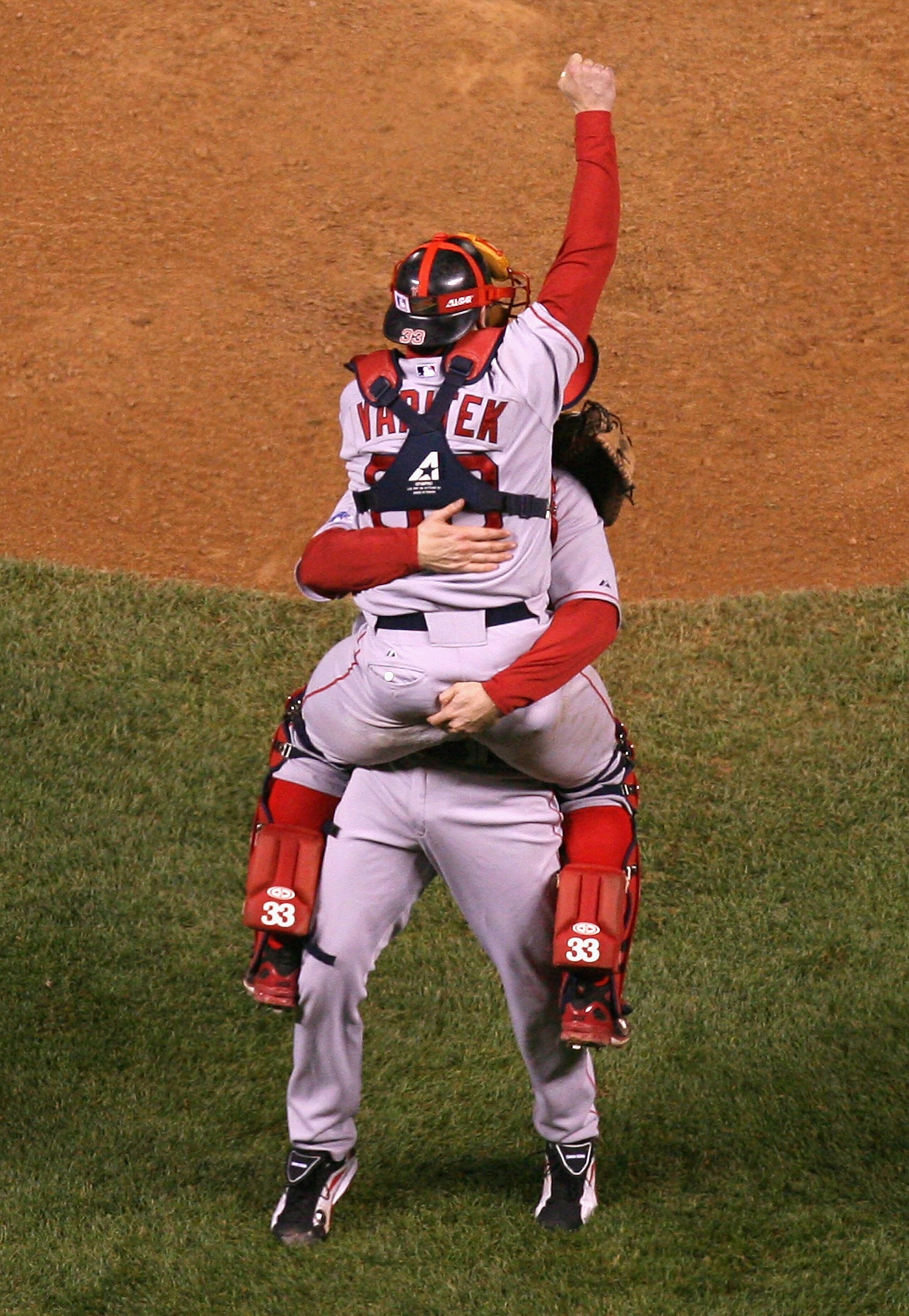 DENVER - OCTOBER 28: Relief pitcher Jonathan Papelbon #58 of the Boston Red Sox celebrates with Jason Varitek #33 after defeating the Colorado Rockies in Game Four of the 2007 World Series at Coors Field on October 28, 2007 in Denver, Colorado The Red S DENVER - OCTOBER 28: Relief pitcher Jonathan Papelbon #58 of the Boston Red Sox celebrates with Jason Varitek #33 after defeating the Colorado Rockies in Game Four of the 2007 World Series at Coors Field on October 28, 2007 in Denver, Colorado The Red S