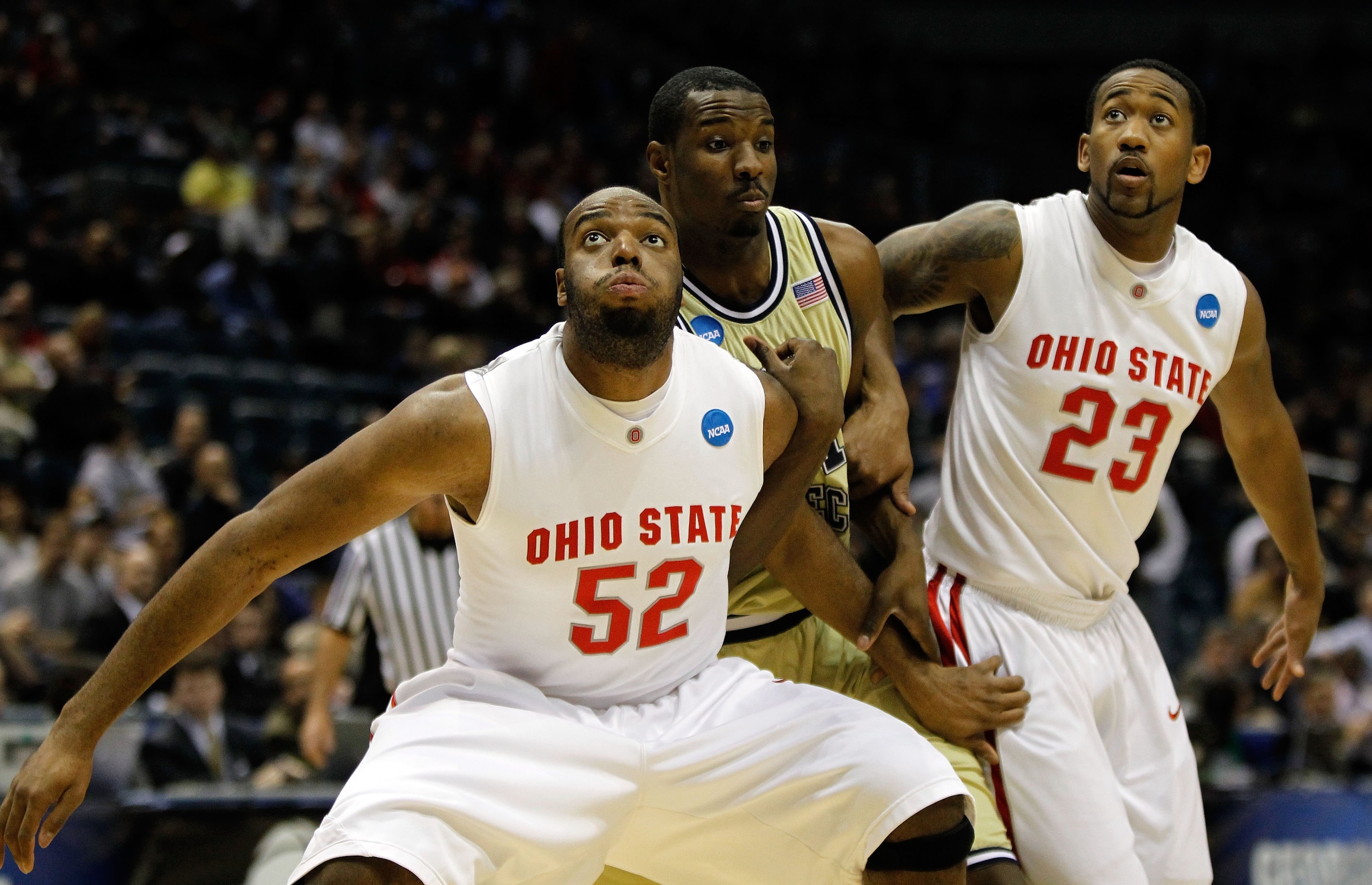 MILWAUKEE - MARCH 21:  Dallas Lauderdale #52 and David Lighty #23 of the Ohio State Buckeyes box out Gani Lawal #31 of the Georgia Tech Yellow Jackets during the second round of the 2010 NCAA men's basketball tournament at the Bradley Center on March 21,