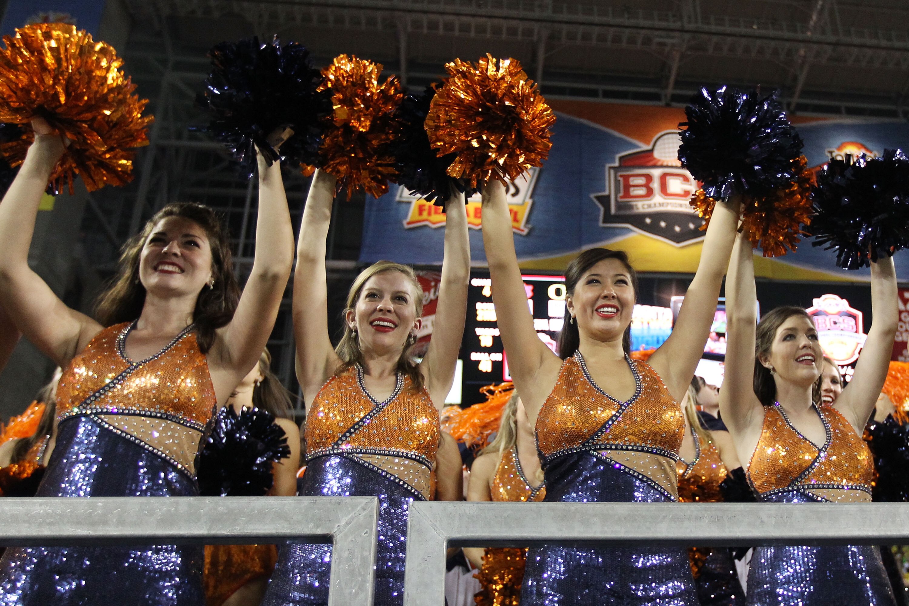 GLENDALE, AZ - JANUARY 10:  Auburn Tigers cheerleaders perform during the Tostitos BCS National Championship Game against the Oregon Ducks at University of Phoenix Stadium on January 10, 2011 in Glendale, Arizona.  (Photo by Christian Petersen/Getty Image