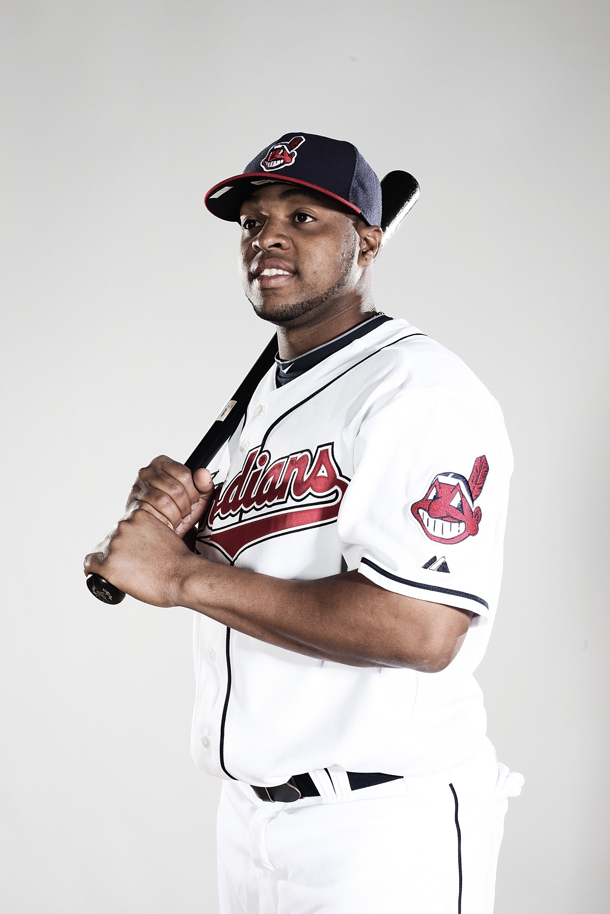 GOODYEAR, AZ - FEBRUARY 28:  (EDITORS NOTE: This images was digitally desaturated.) Carlos Santana #77 poses for a portrait during the Cleveland Indians Photo Day at the training complex at Goodyear Stadium on February 28, 2010 in Goodyear, Arizona.  (Pho