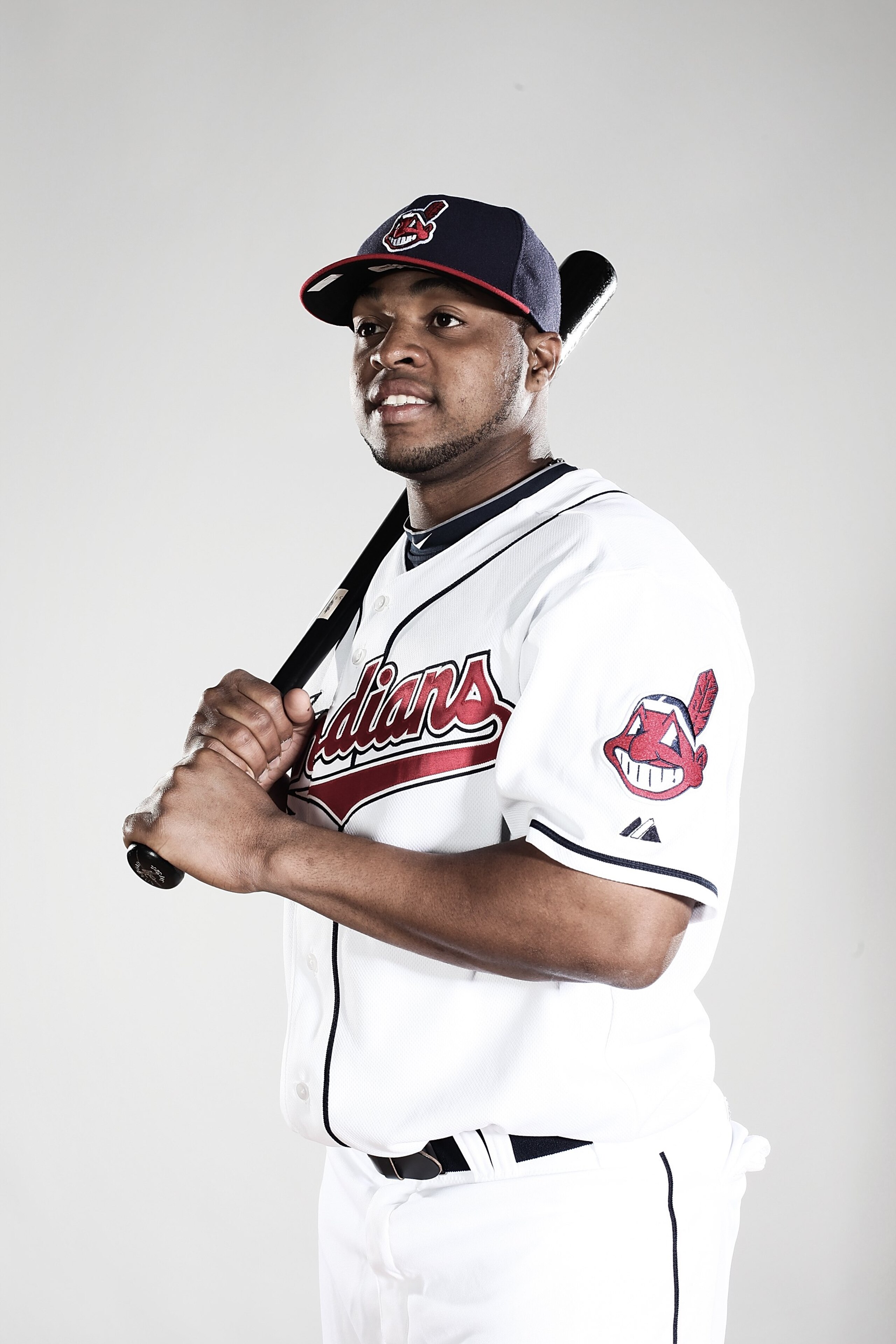 GOODYEAR, AZ - FEBRUARY 28:  (EDITORS NOTE: This images was digitally desaturated.) Carlos Santana #77 poses for a portrait during the Cleveland Indians Photo Day at the training complex at Goodyear Stadium on February 28, 2010 in Goodyear, Arizona.  (Pho