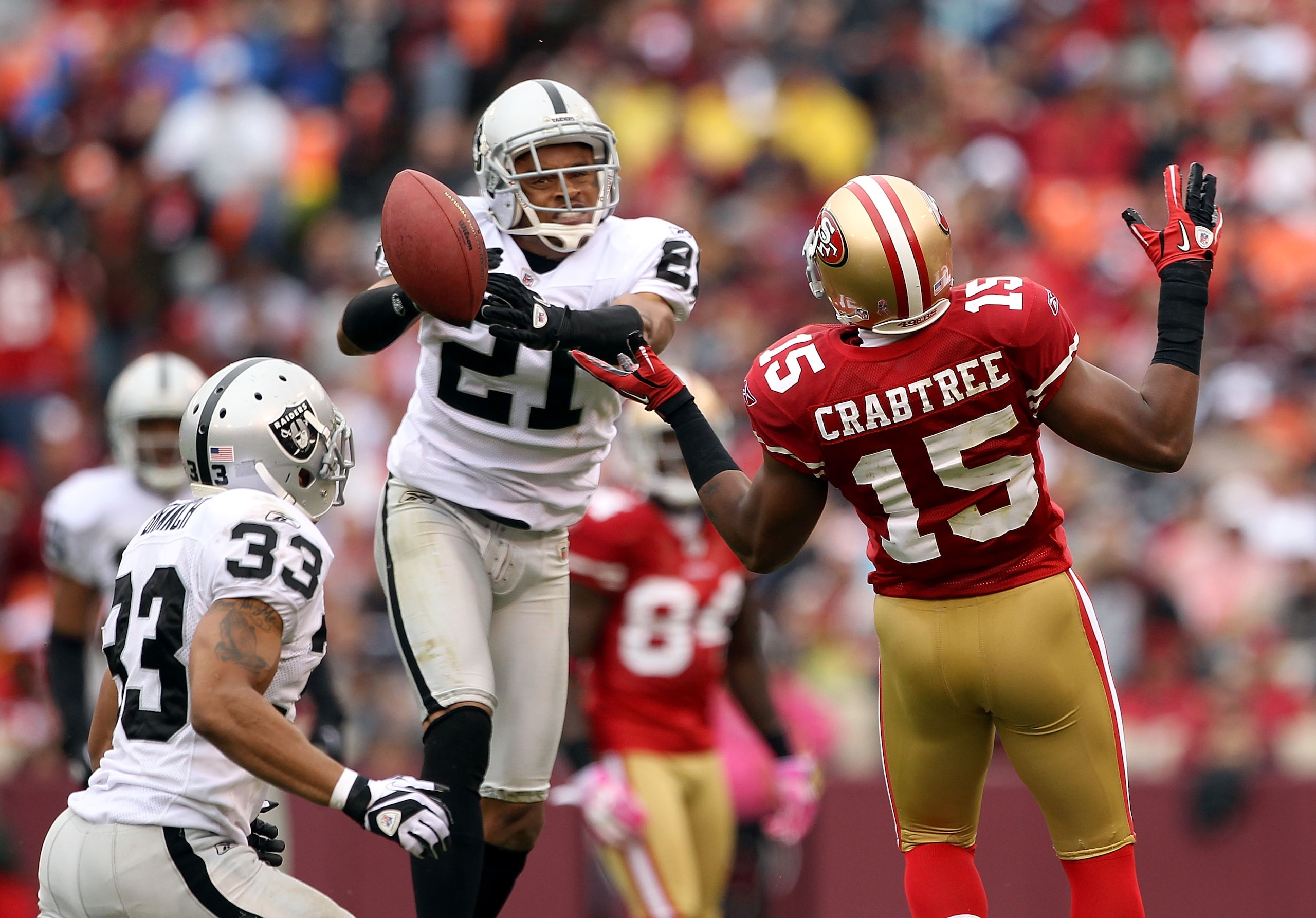 SAN FRANCISCO - OCTOBER 17: Nnamdi Asomugha #21 of the Oakland Raiders breaks up a pass intended for Michael Crabtree #15 of the San Francisco 49ers at Candlestick Park on October 17, 2010 in San Francisco, California. (Photo by Ezra Shaw/Getty Images) SAN FRANCISCO - OCTOBER 17: Nnamdi Asomugha #21 of the Oakland Raiders breaks up a pass intended for Michael Crabtree #15 of the San Francisco 49ers at Candlestick Park on October 17, 2010 in San Francisco, California. (Photo by Ezra Shaw/Getty Images)