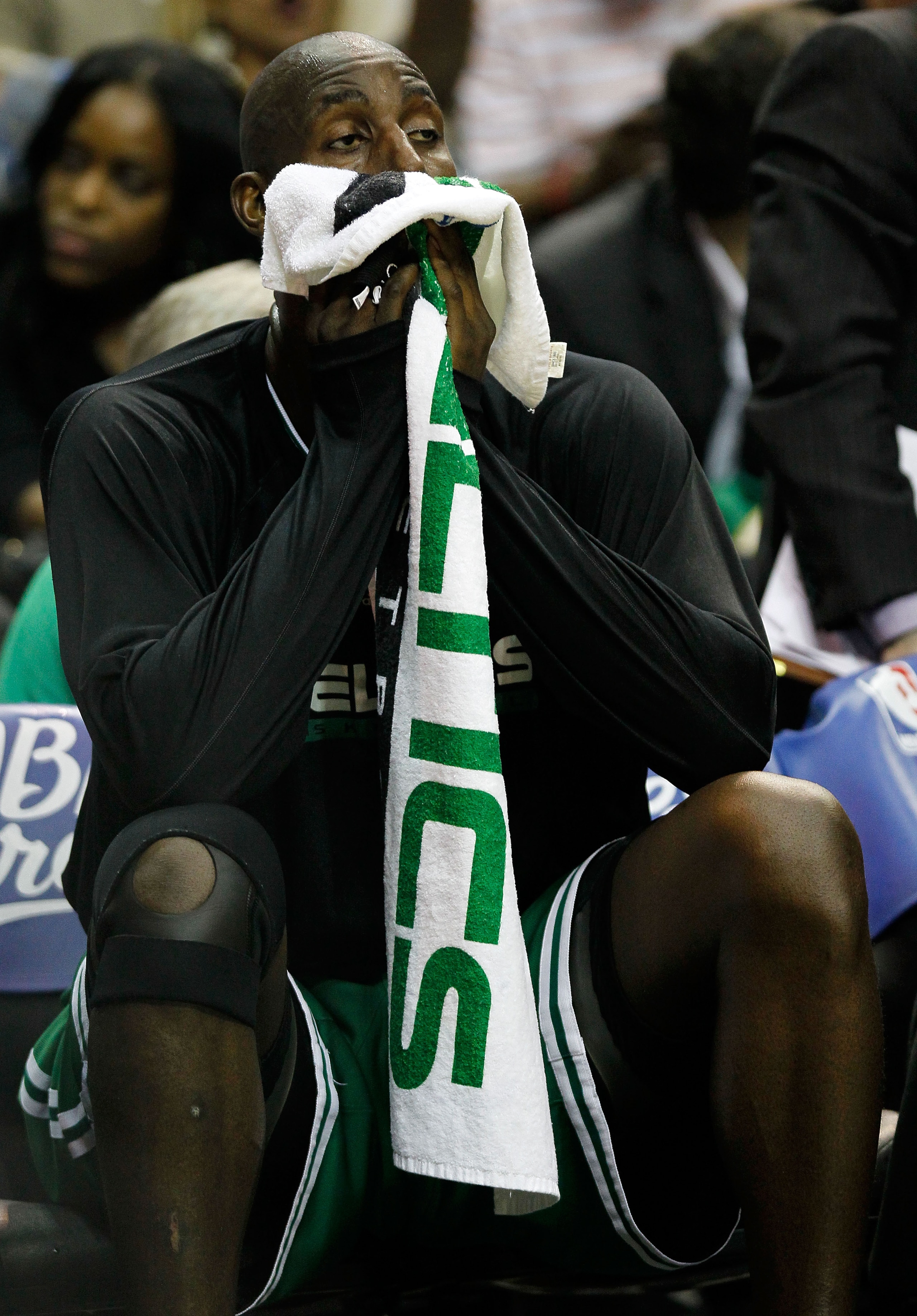 ORLANDO, FL - MAY 26:  Kevin Garnett #5 of the Boston Celtics wipes his face with a towel on the bench against the Orlando Magic in Game Five of the Eastern Conference Finals during the 2010 NBA Playoffs at Amway Arena on May 26, 2010 in Orlando, Florida.