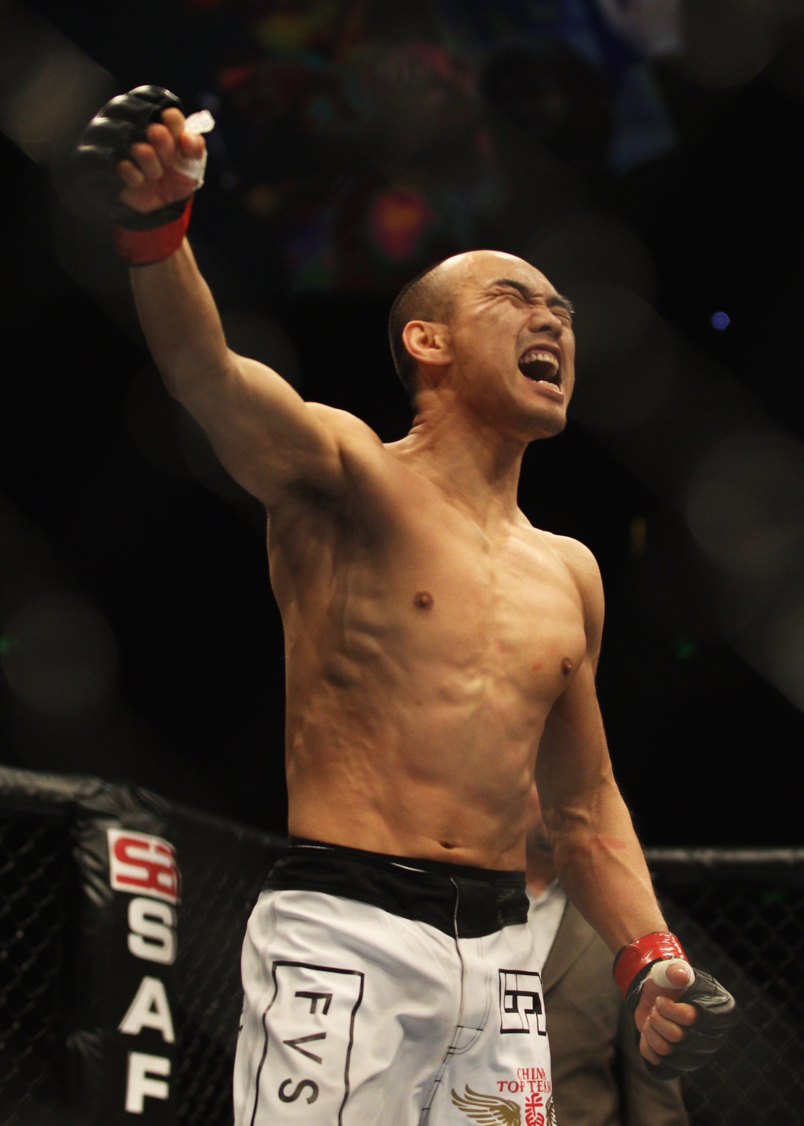 SYDNEY, AUSTRALIA - FEBRUARY 27:  Tiequan Zhang of  China celebrates his victory over Jason Reinhardt of the USA during their middleweight bout as part of UFC 127 at Acer Arena on February 27, 2011 in Sydney, Australia.  (Photo by Mark Kolbe/Getty Images)