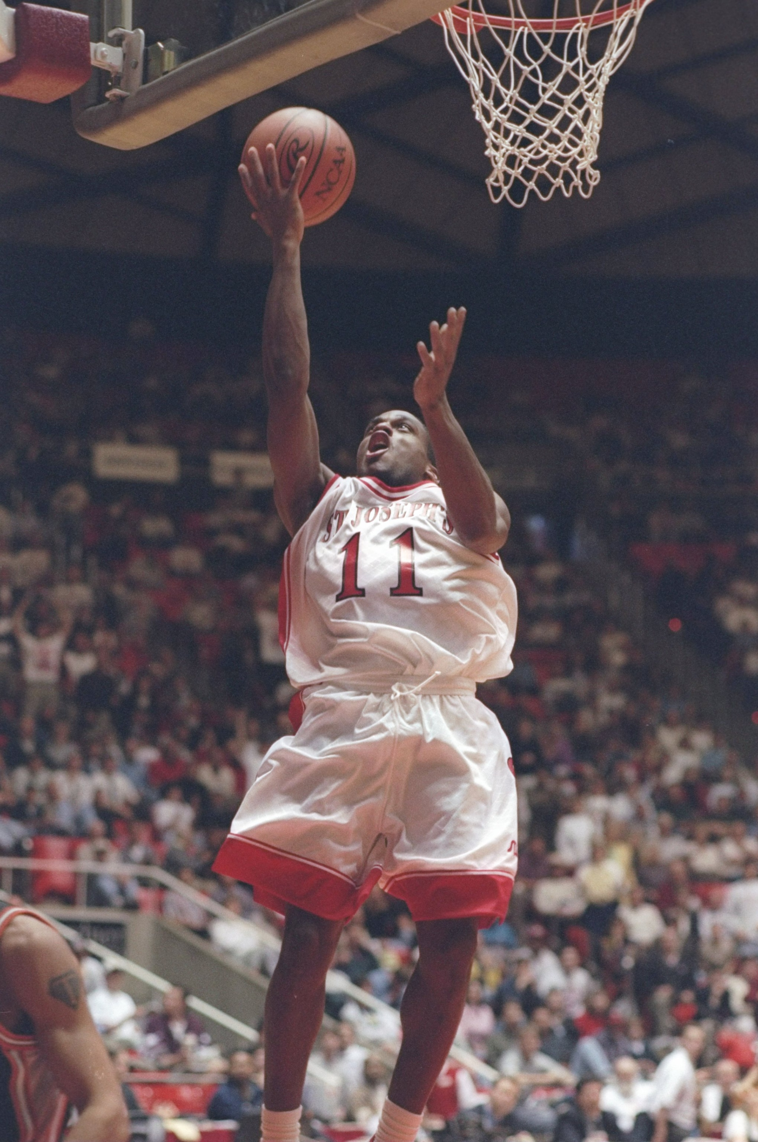 13 Mar 1997:  Guard Rashid Bey of the St. Joseph''s Hawks drives to basket during a playoff game against the Pacific Tigers at the Jon M. Huntsman Center in Salt Lake City, Utah.  The Hawks won the game 75 - 65. Mandatory Credit: Otto Greule Jr.  /Allspor
