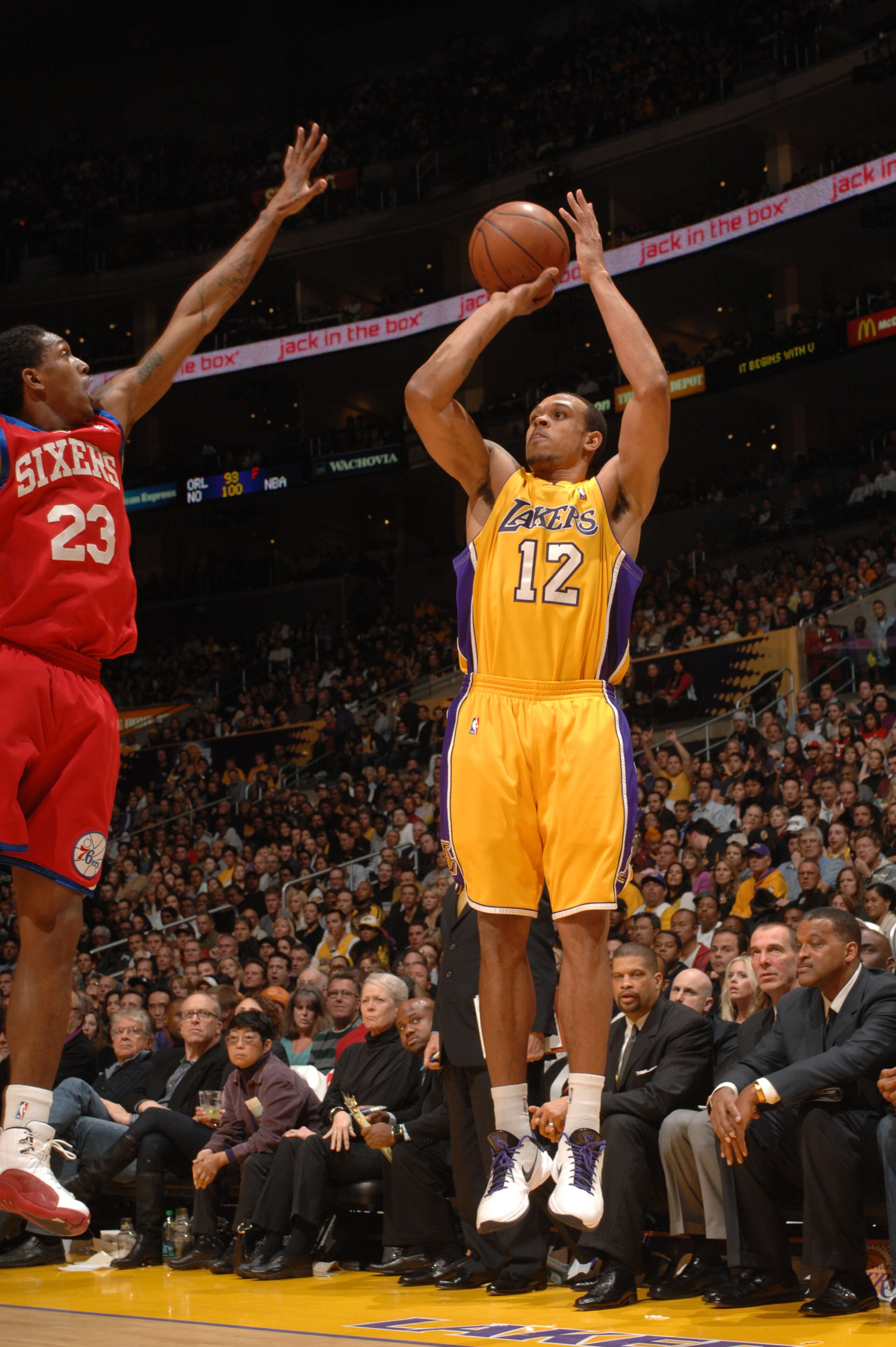 LOS ANGELES - FEBRUARY 26:  Shannon Brown #12 of the Los Angeles Lakers shoots against Louis Williams #23 of the Philadelphia 76ers at Staples Center on February 26, 2010 in Los Angeles, California. NOTE TO USER: User expressly acknowledges and agrees tha