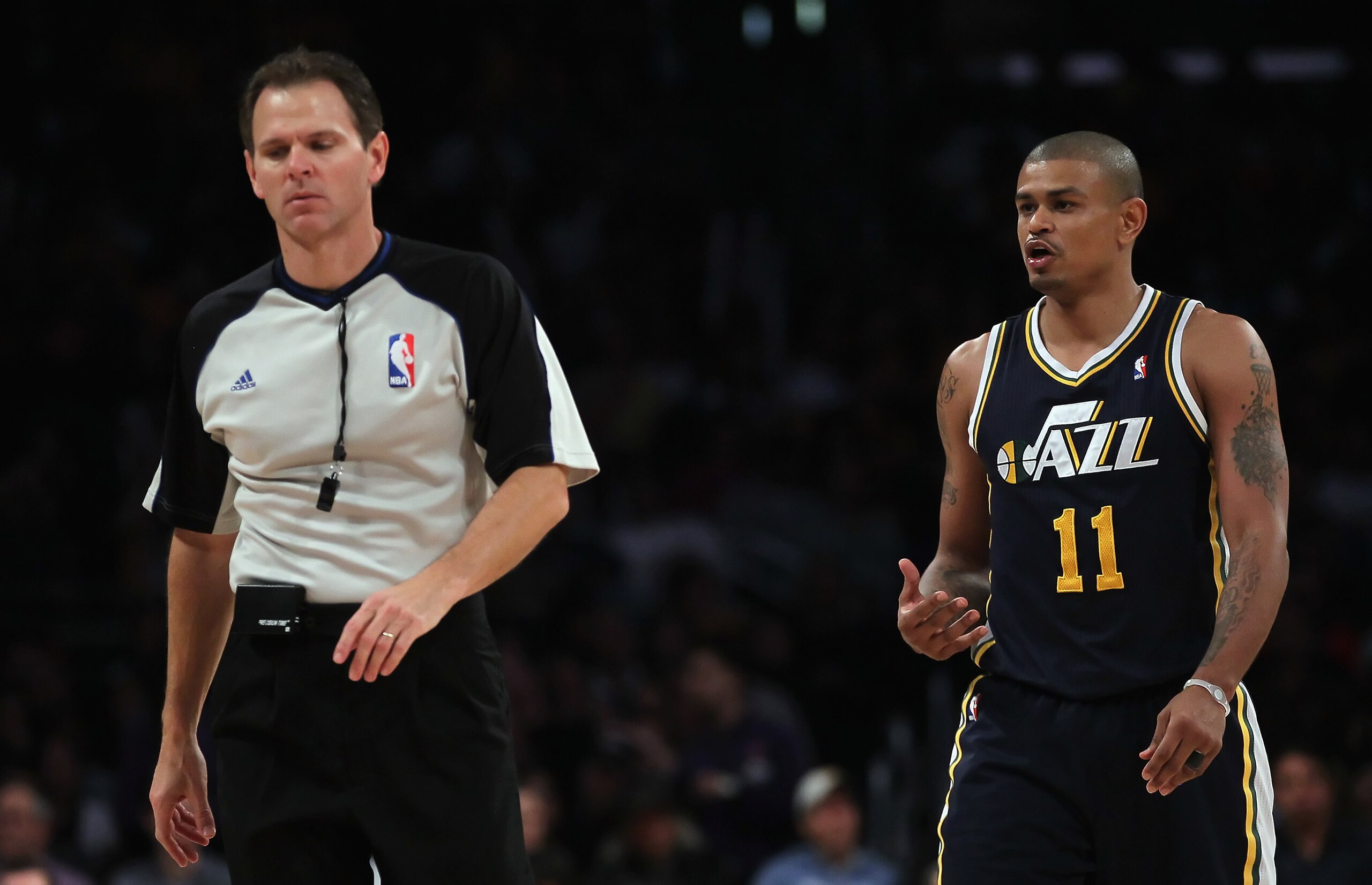 LOS ANGELES, CA - JANUARY 25:  Earl Watson #11 of the Utah Jazz argues a call with referee Mark Ayotte against the Los Angeles Lakers in the second half at Staples Center on January 25, 2011 in Los Angeles, California. The Lakers defeated the Jazz 120-91.