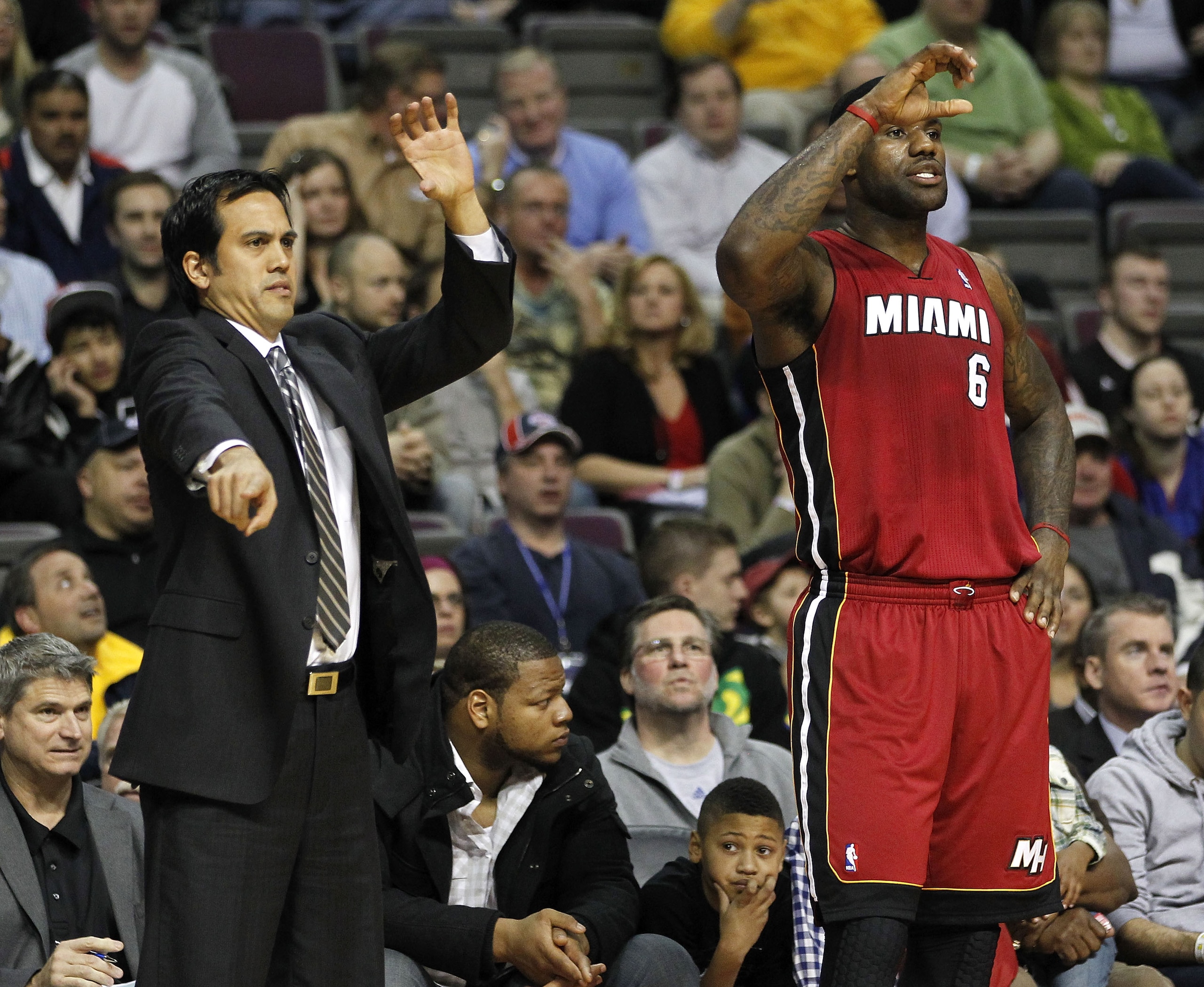 AUBURN HILLS, MI - FEBRUARY 11:  LeBron James #6 of the Miami Heat calls out a play from the sideline next to head coach Erik Spoelstra while playing the Detroit Pistons at The Palace of Auburn Hills on February 11, 2011 in Auburn Hills, Michigan.  NOTE T