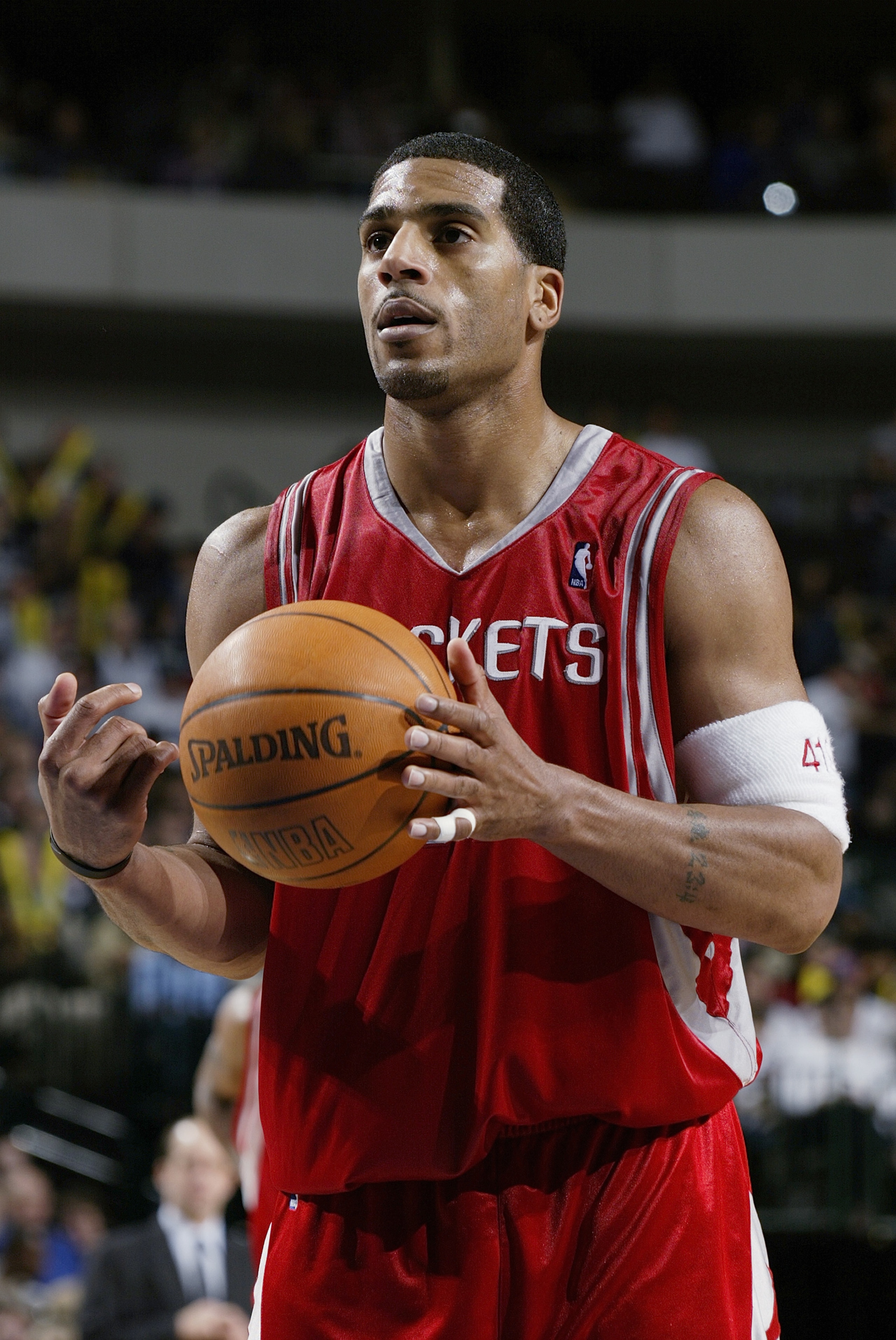 DALLAS - FEBRUARY 21:  Jim Jackson #21 of the Houston Rockets gets ready to shoot a free throw during the game against the Dallas Mavericks on February 21, 2004 at American Airlines Center in Dallas, Texas.  The Mavericks won 97-88.  NOTE TO USER: User ex
