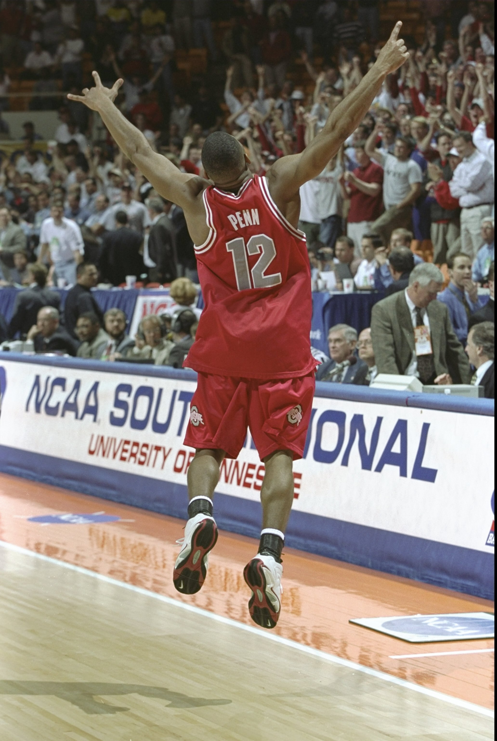 20 Mar 1999:  James 'Scoonie' Penn #12 of the Ohio State Buckeyes celebrating during the NCAA Southern Regional game against the St. John's Red Storm at the Thompson-Boling Arena in Knoxville, Tennessee. The Buckeyes defeated the Red Storm 77-74. Mandator