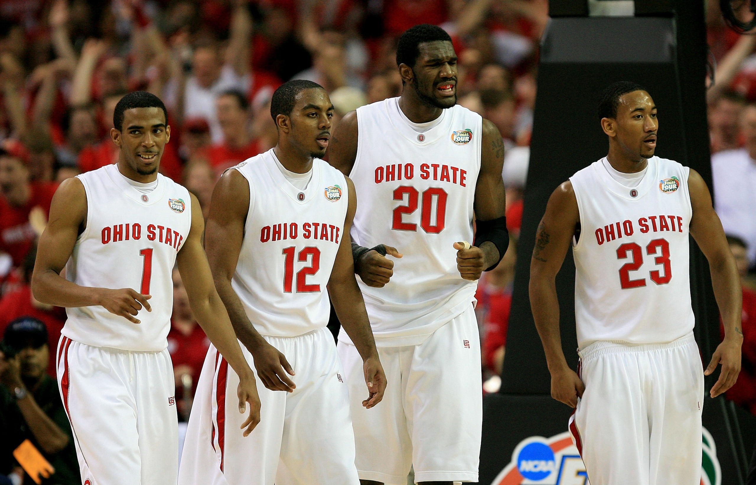 ATLANTA - MARCH 31:  Mike Conley Jr. #1, Ron Lewis #12, Greg Oden #20 and David Lightly #23 all of the Ohio State Buckeyes walk up the court against the Georgetown Hoyas during the National Semifinal game of the NCAA Men's Final Four at the Georgia Dome o
