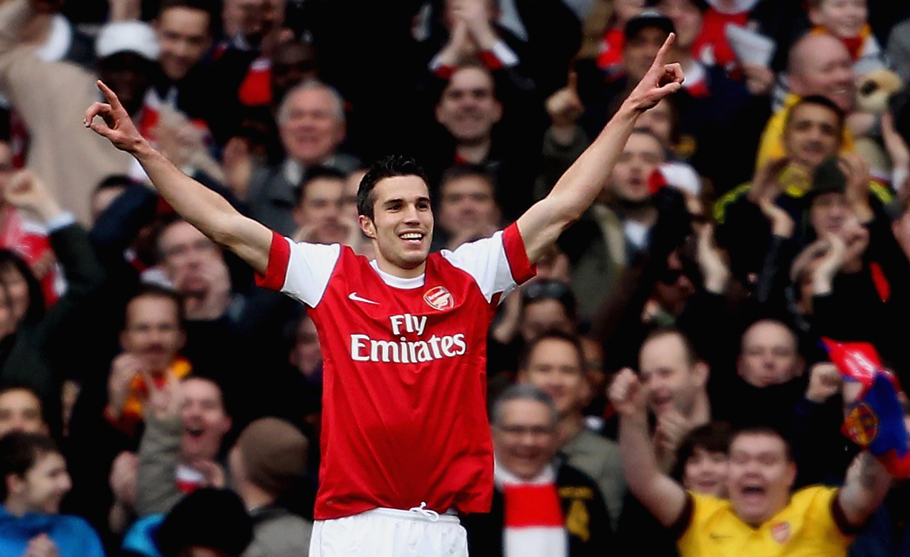 LONDON, ENGLAND - FEBRUARY 12:  Robin Van Persie of Arsenal celebrates after scoring their first goal during the Barclays Premier League match between Arsenal and Wolverhampton Wanderers on February 12, 2011 in London, England.  (Photo by Scott Heavey/Get