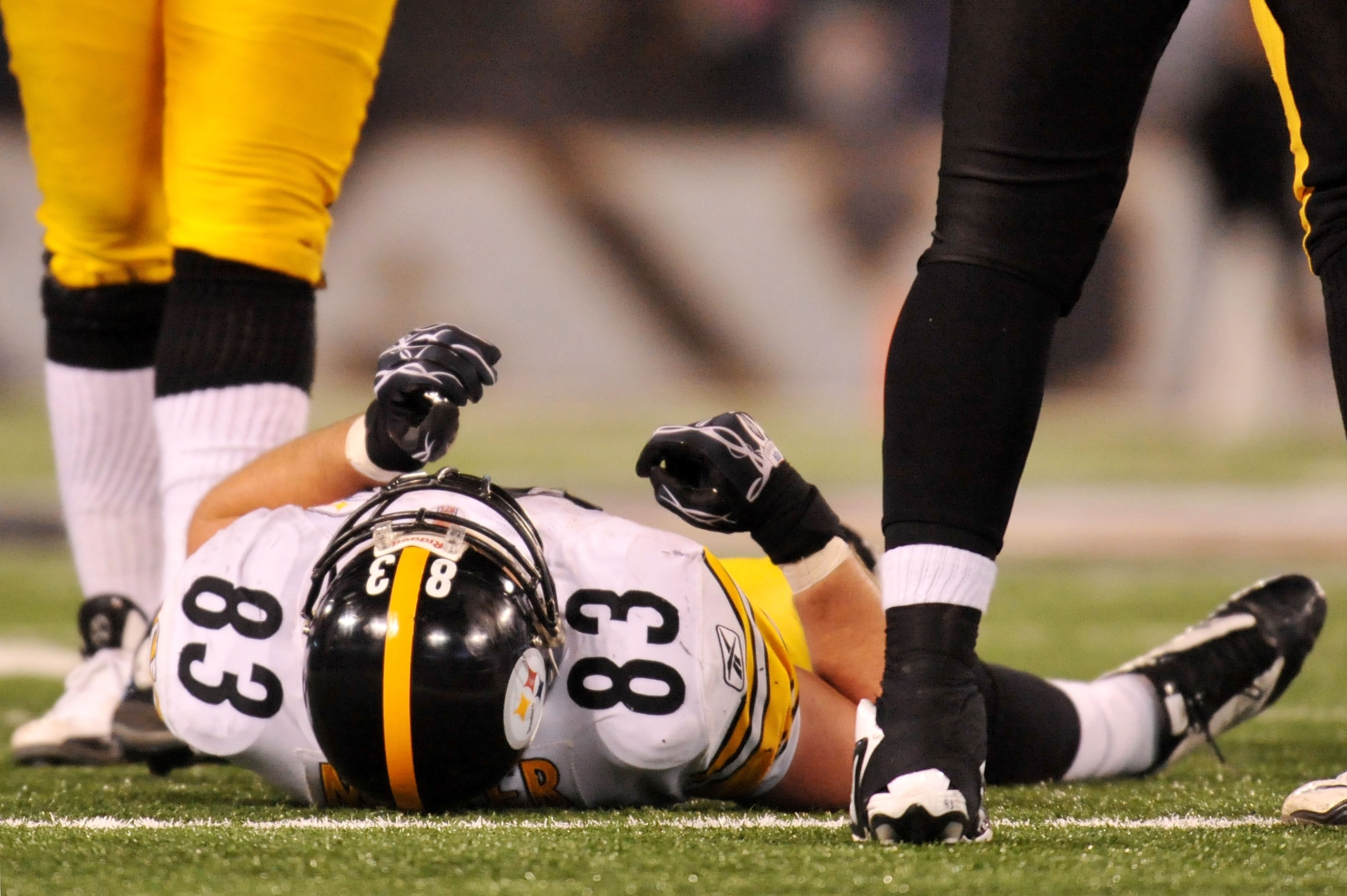 BALTIMORE, MD - DECEMBER 05: Tight end Heath Miller #83 of the Pittsburgh Steelers lies on the field after being injured during the third quarter of the game against the Baltimore Ravens at M&T Bank Stadium on December 5, 2010 in Baltimore, Maryland. (P BALTIMORE, MD - DECEMBER 05: Tight end Heath Miller #83 of the Pittsburgh Steelers lies on the field after being injured during the third quarter of the game against the Baltimore Ravens at M&T Bank Stadium on December 5, 2010 in Baltimore, Maryland. (P