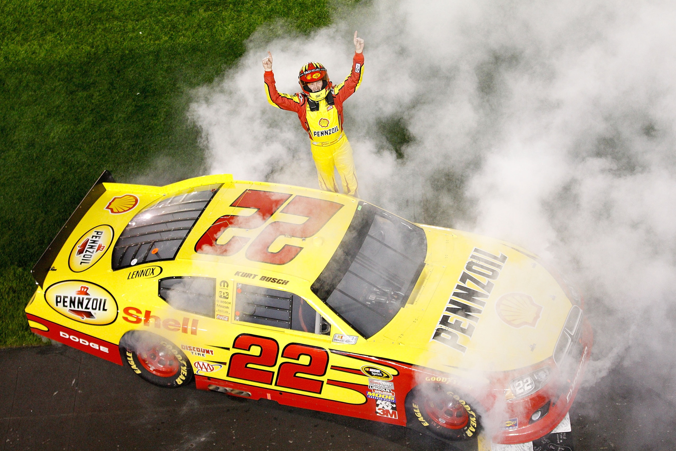 DAYTONA BEACH, FL - FEBRUARY 12:  Kurt Busch, driver of the #22 Shell/Pennzoil Dodge, celebrates after winning the NASCAR Budweiser Shootout at Daytona International Speedway on February 12, 2011 in Daytona Beach, Florida.  (Photo by Chris Graythen/Getty