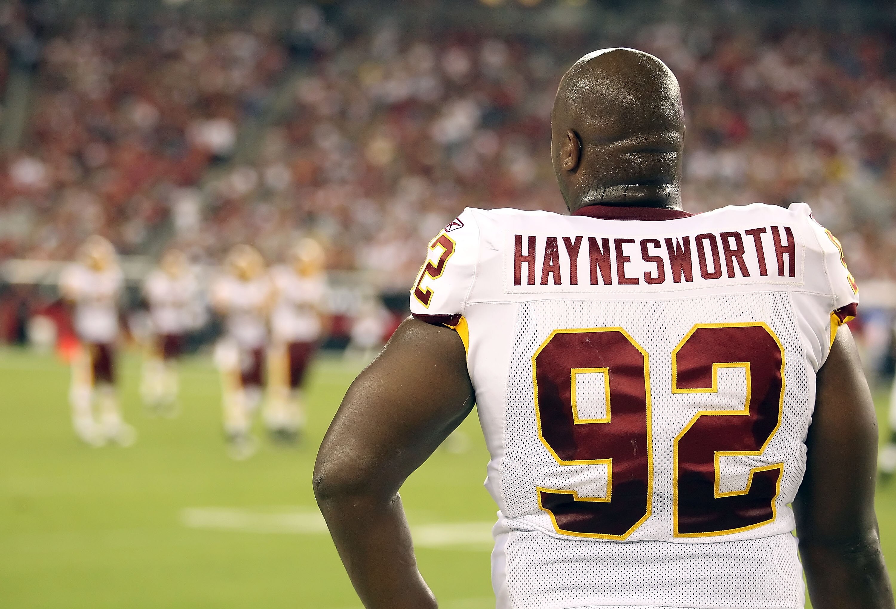 GLENDALE, AZ - SEPTEMBER 02:  Defensive tackle Albert Haynesworth #92 of the Washington Redskins stands on the sidelines during preseason NFL game against the Arizona Cardinals at the University of Phoenix Stadium on September 2, 2010 in Glendale, Arizona