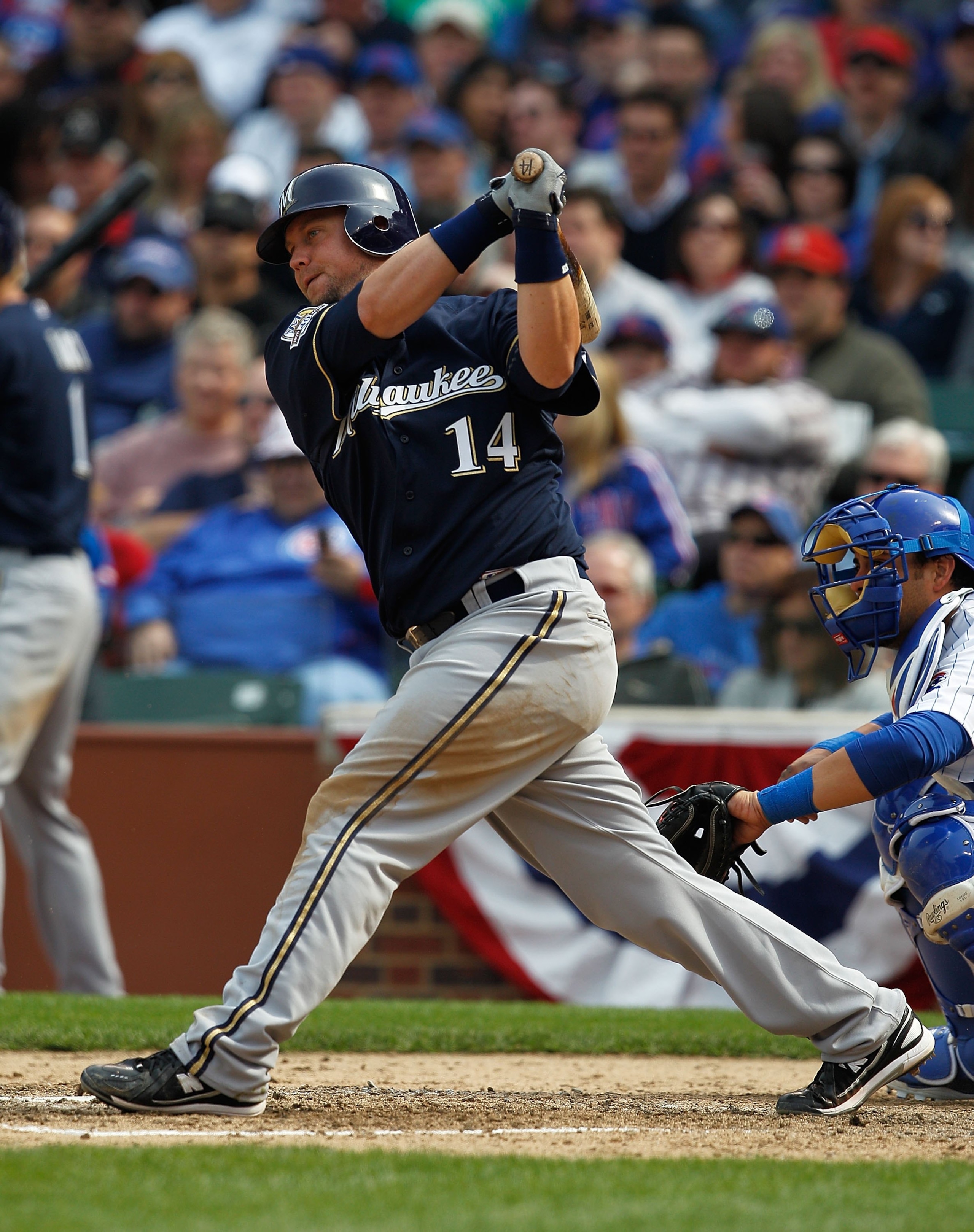CHICAGO - APRIL 12: Casey McGehee #14 of the Milwaukee Brewers hits the ball against the Chicago Cubs on Opening Day at Wrigley Field on April 12, 2010 in Chicago, Illinois. The Cubs defeated the Brewers 9-5. (Photo by Jonathan Daniel/Getty Images)