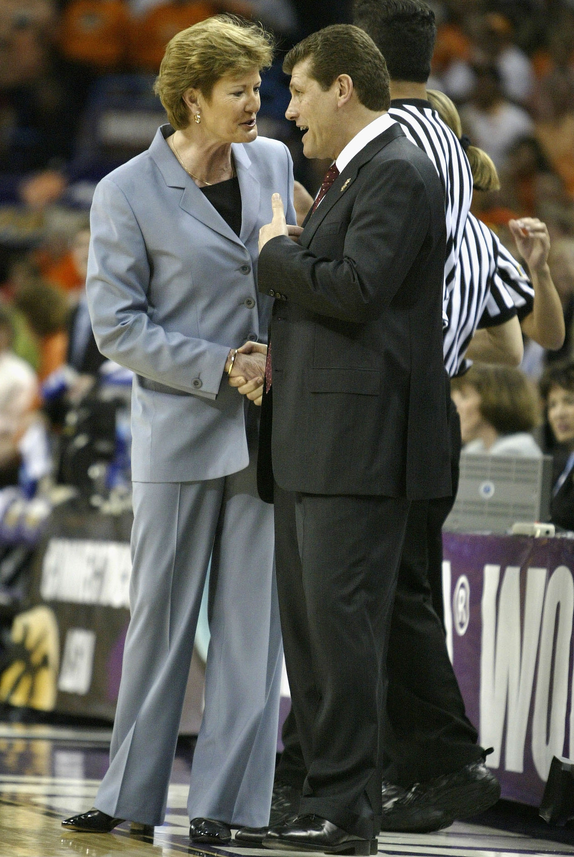 NEW ORLEANS - APRIL 6:  Head coach Pat Summitt of the Tennessee Lady Vols (L) and head coach Geno Auriemma of the University of Connecticut Huskies meet before the National Championship game of the NCAA Women's Final Four Tournament at the New Orleans Are