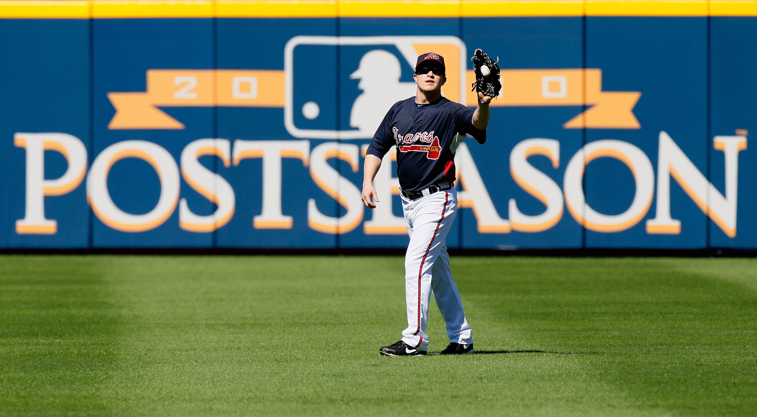 ATLANTA - OCTOBER 10:  Nate McLouth #24 of the Atlanta Braves warms up before facing the San Francisco Giants during Game Three of the NLDS of the 2010 MLB Playoffs at Turner Field on October 10, 2010 in Atlanta, Georgia.  (Photo by Kevin C. Cox/Getty Ima