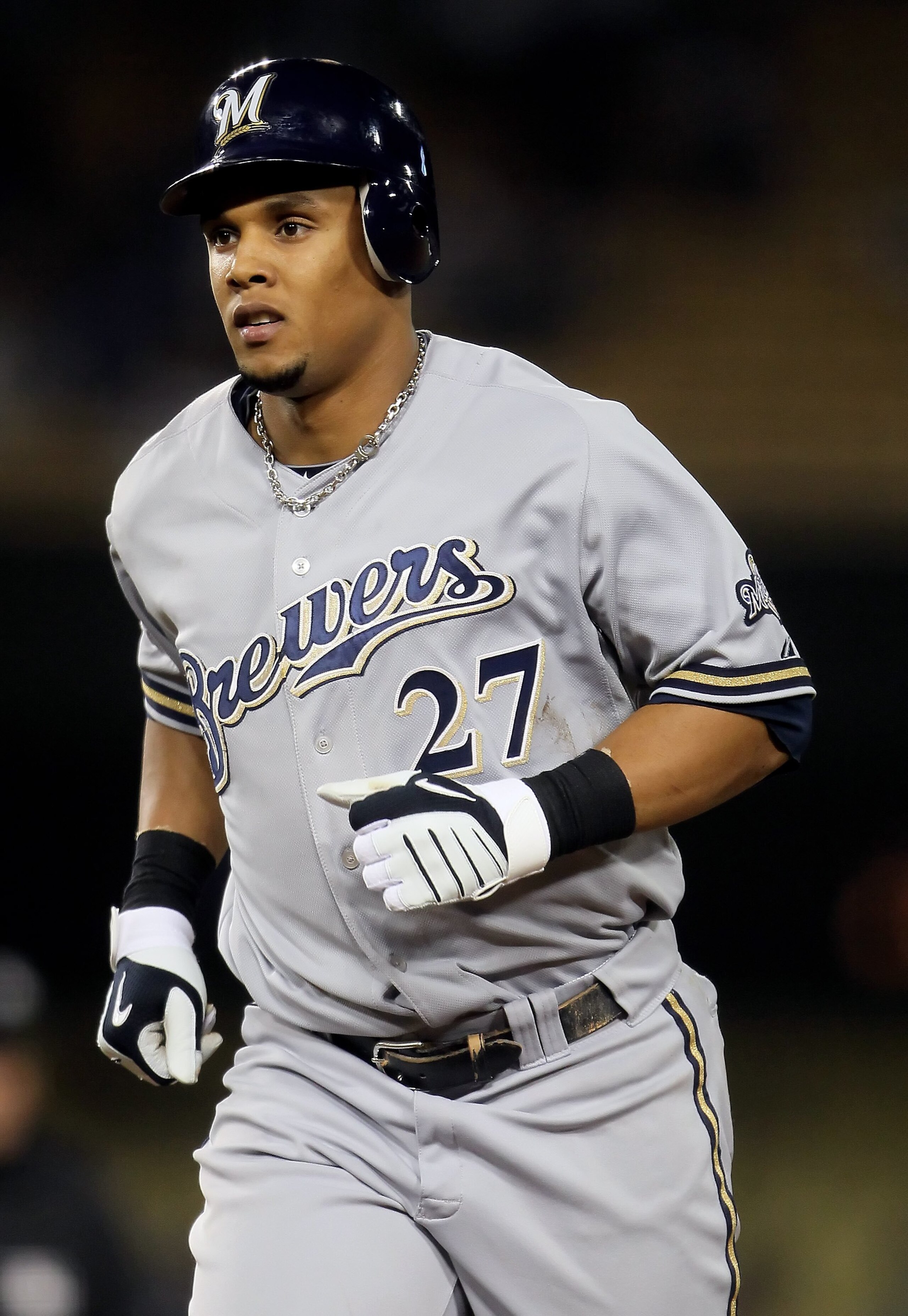 LOS ANGELES, CA - MAY 04:  Carlos Gomez #27 of the Milwaukee Brewers runs back to the dugout against the Los Angeles Dodgers at Dodger Stadium on May 4, 2010 in Los Angeles, California. The Brewers defeated the Dodgers 11-6.  (Photo by Jeff Gross/Getty Im