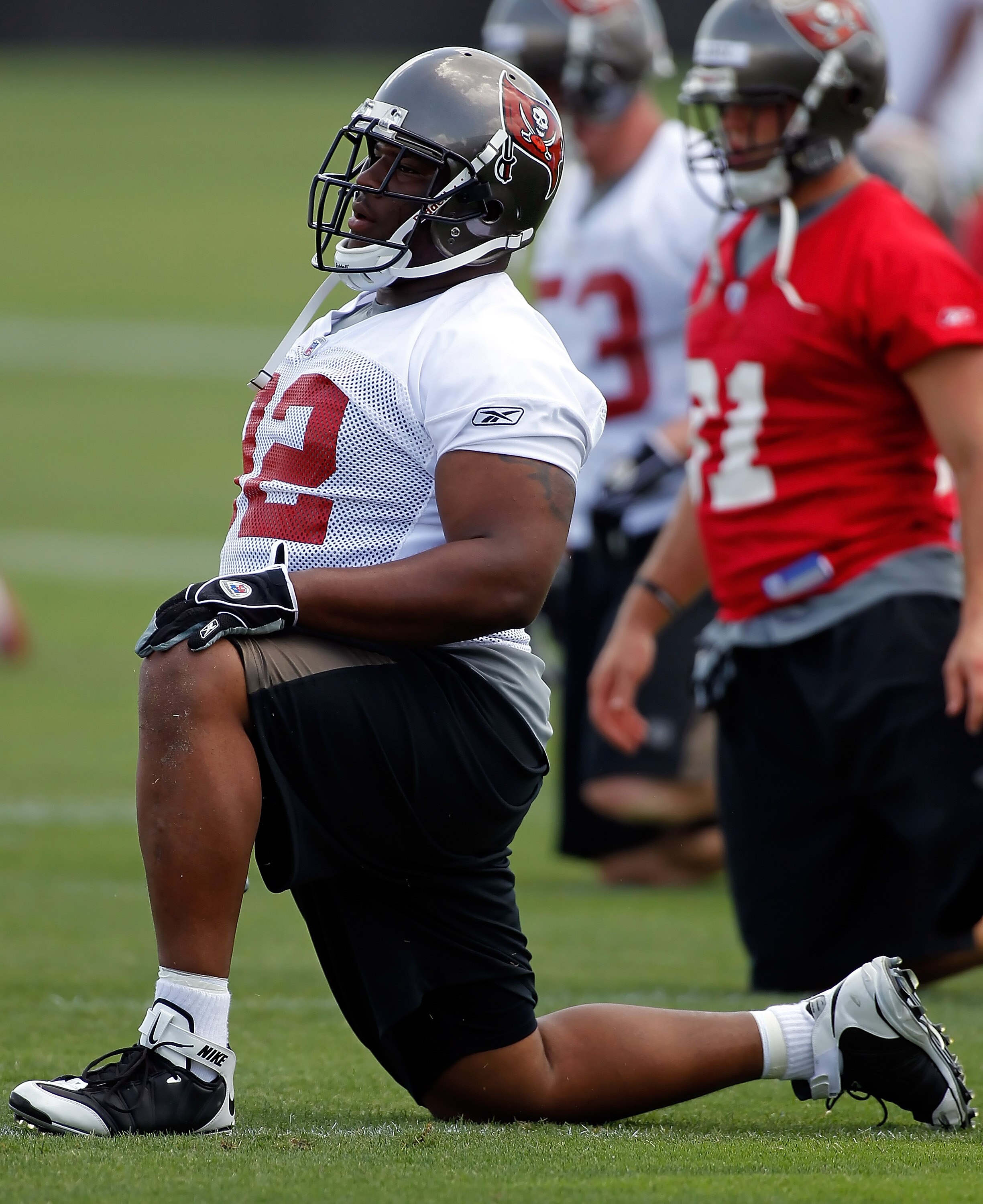 TAMPA, FL - MAY 01:  Defensive tackle Brian Price #92 of the Tampa Bay Buccaneers stretches during the Buccaneers Rookie mini camp at One Buccaneer Place on May 1, 2010 in Tampa, Florida.  (Photo by J. Meric/Getty Images)