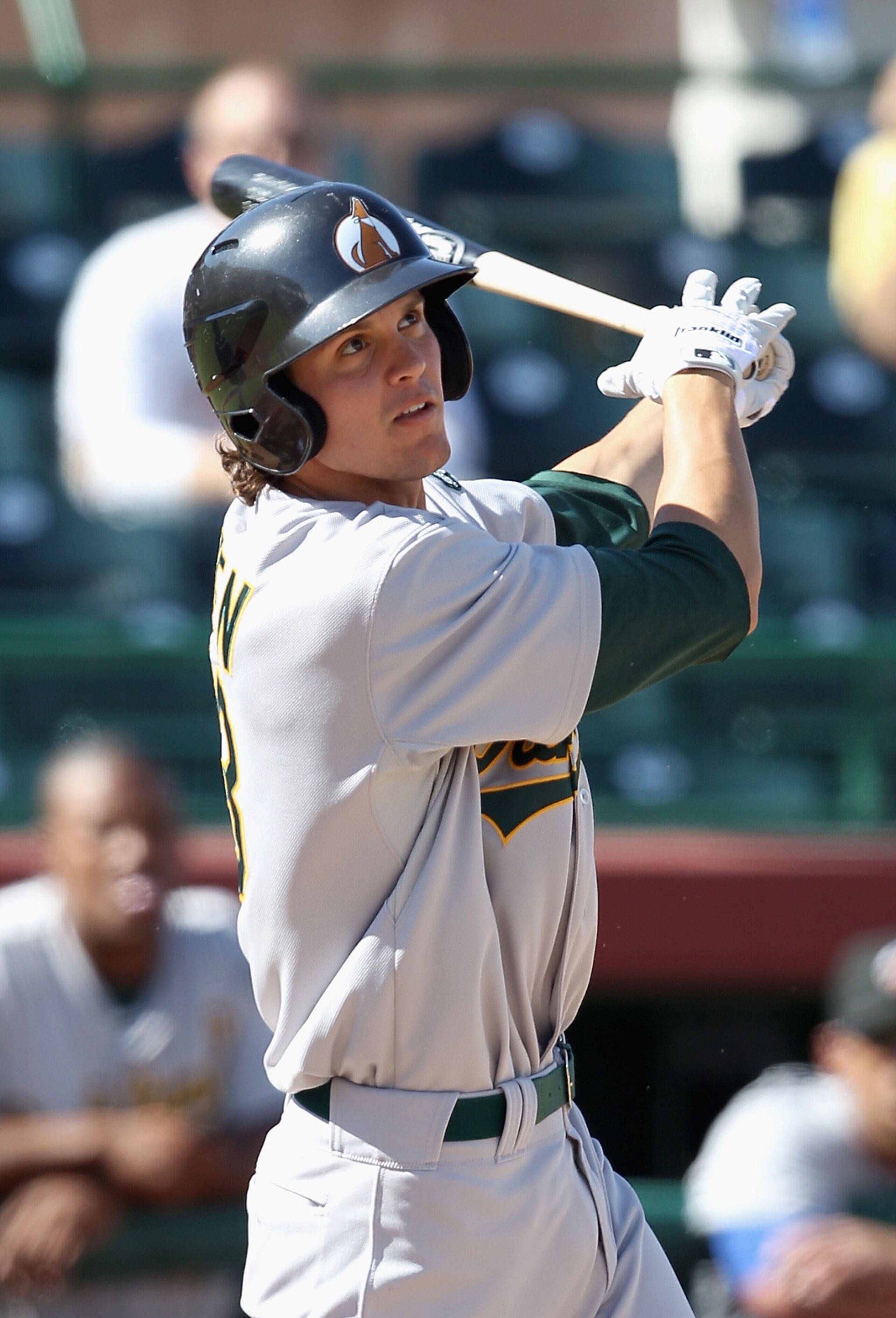 SCOTTSDALE, AZ - OCTOBER 23:  Oakland Athletics prospect Grant Green playing for the Phoenix Desert Dogs bats against the Scottsdale Scorpions during the AZ Fall League game at Scottsdale Stadium on October 23, 2010 in Scottsdale, Arizona.  (Photo by Chri