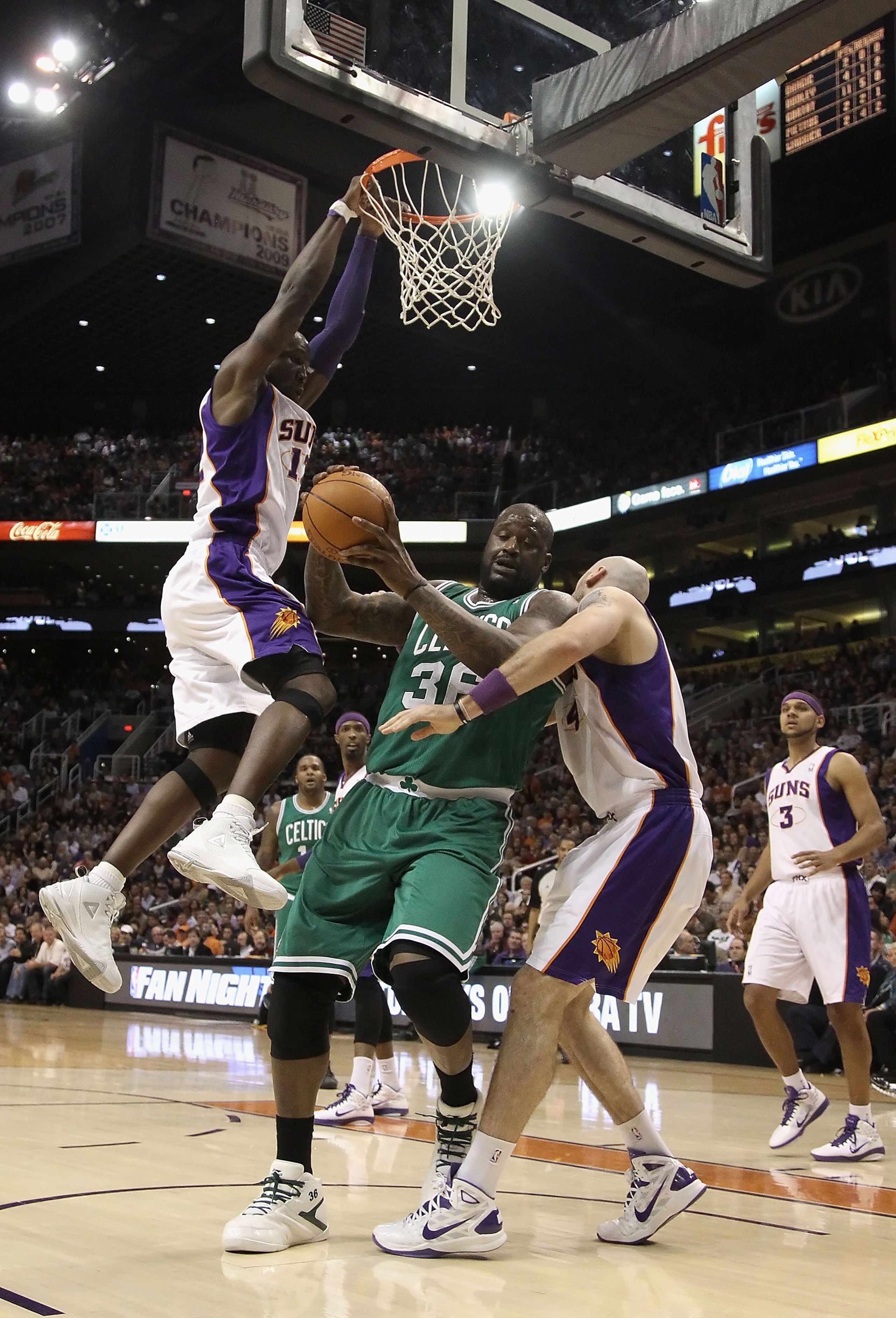PHOENIX, AZ - JANUARY 28:  Shaquille O'Neal #36 of the Boston Celtics handles the ball during the NBA game against the Phoenix Suns at US Airways Center on January 28, 2011 in Phoenix, Arizona.  The Suns defeated the Celtics 88-71.  NOTE TO USER: User exp