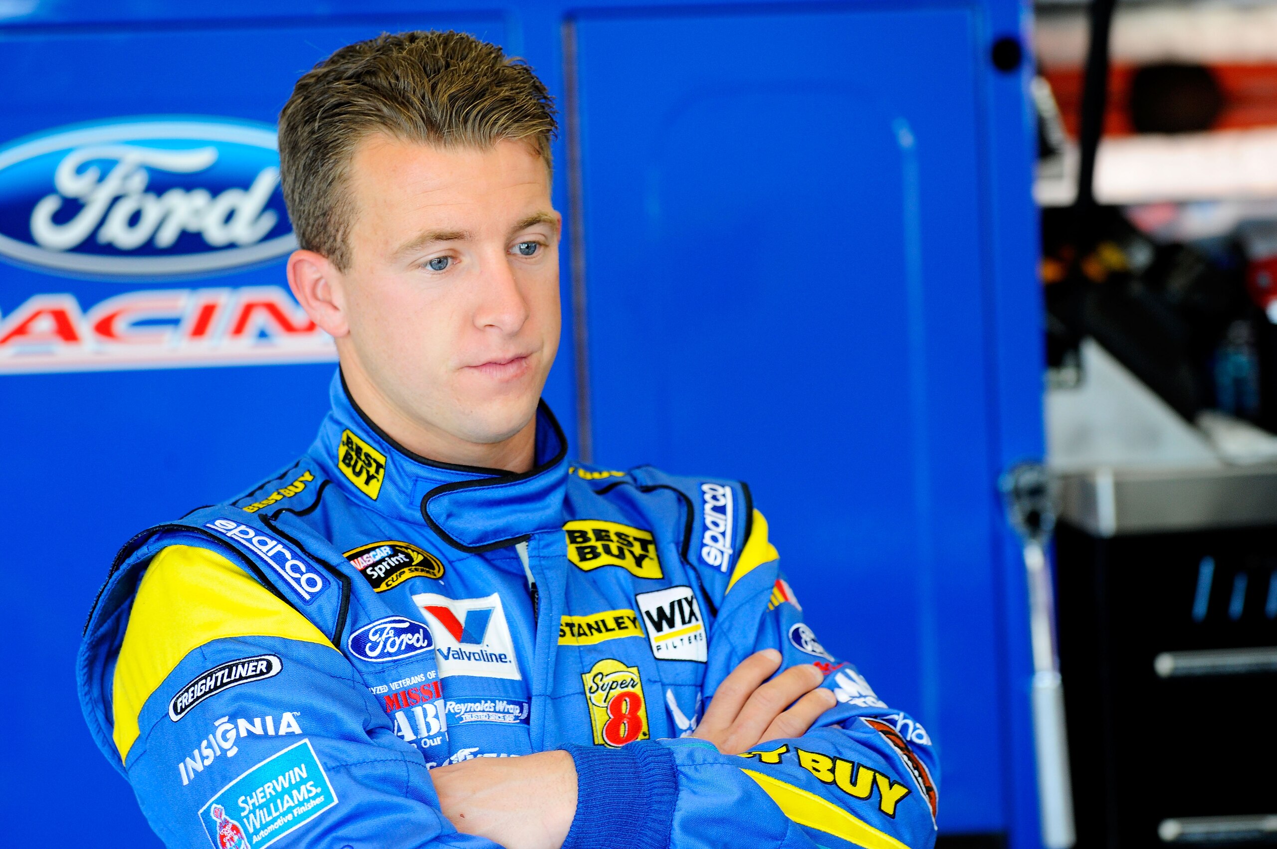 DAYTONA BEACH, FL - FEBRUARY 12: A.J. Allmendinger, driver of the #43 Best Buy Ford, stands in the garage during practice for the NASCAR Sprint Cup Series Daytona 500 at Daytona International Speedway on February 12, 2011 in Daytona Beach, Florida. (Pho DAYTONA BEACH, FL - FEBRUARY 12: A.J. Allmendinger, driver of the #43 Best Buy Ford, stands in the garage during practice for the NASCAR Sprint Cup Series Daytona 500 at Daytona International Speedway on February 12, 2011 in Daytona Beach, Florida. (Pho