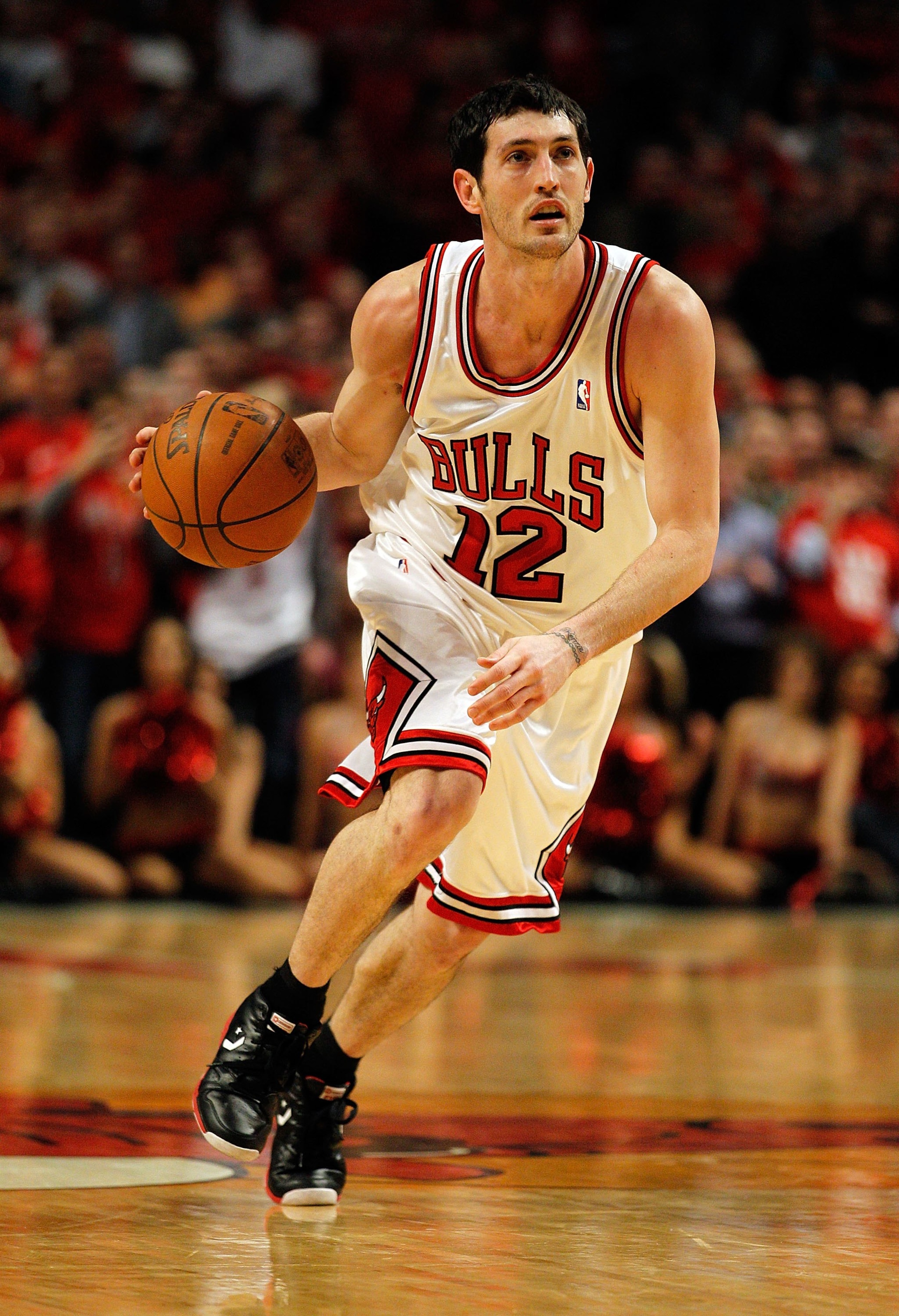 CHICAGO - APRIL 22: Kirk Hinrich #12 of the Chicago Bulls moves up the court against the Cleveland Cavaliers in Game Three of the Eastern Conference Quarterfinals during the 2010 NBA Playoffs at the United Center on April 22, 2010 in Chicago, Illinois. Th