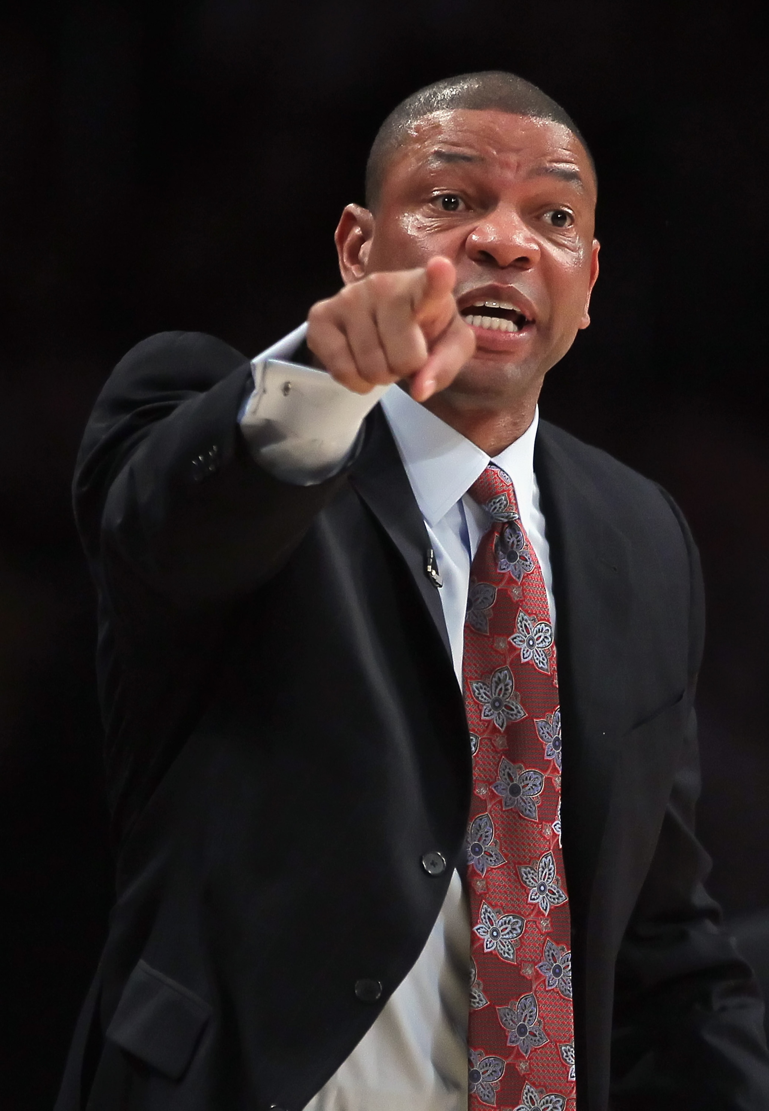 LOS ANGELES, CA - JANUARY 30:  Boston Celtics head coach Doc Rivers shouts instructions from the bench against the Los Angeles Lakers at Staples Center on January 30, 2011 in Los Angeles, California. The Celtics defeated the Lakers 109-96.  (Photo by Jeff