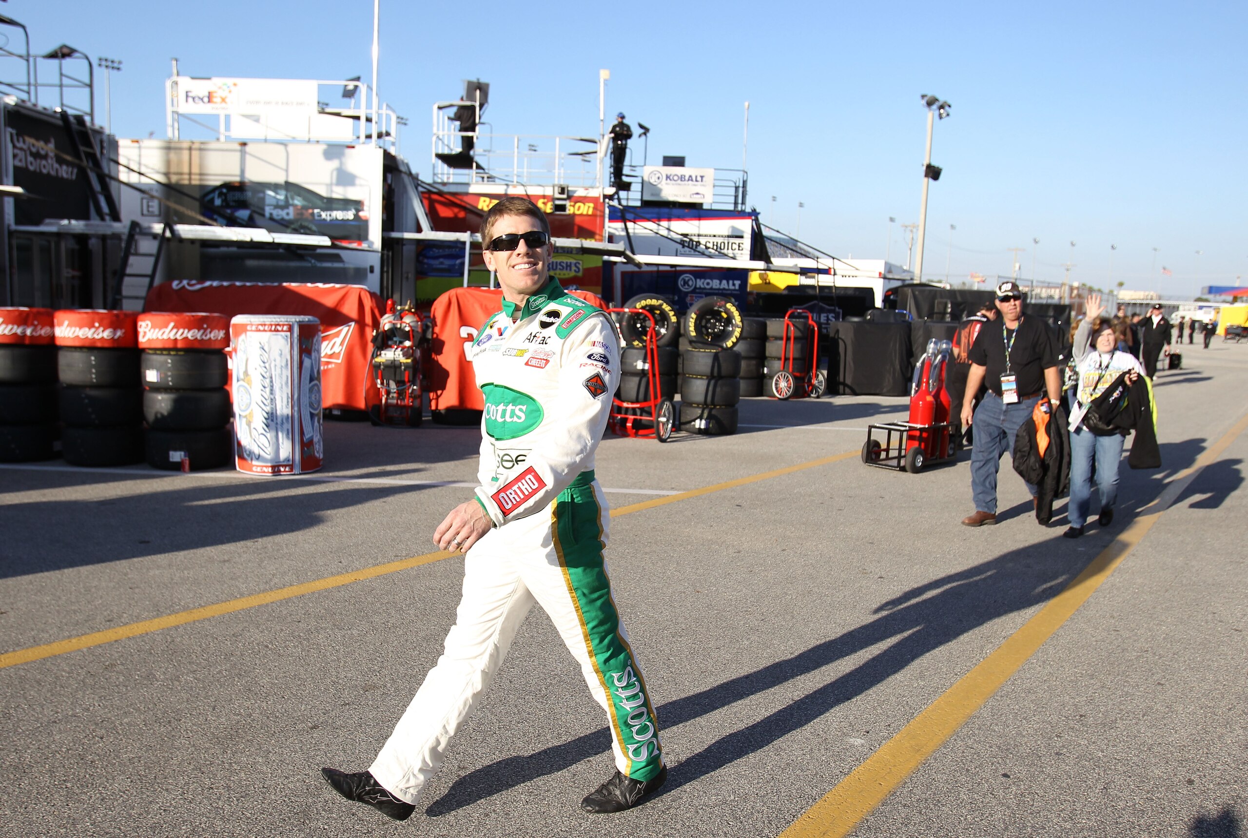 DAYTONA BEACH, FL - FEBRUARY 11: Carl Edwards, driver of the #99 Scotts Ford, walks in the garage area during practice for the NASCAR Budweiser Shootout at Daytona International Speedway on February 11, 2011 in Daytona Beach, Florida. (Photo by Matthew DAYTONA BEACH, FL - FEBRUARY 11: Carl Edwards, driver of the #99 Scotts Ford, walks in the garage area during practice for the NASCAR Budweiser Shootout at Daytona International Speedway on February 11, 2011 in Daytona Beach, Florida. (Photo by Matthew