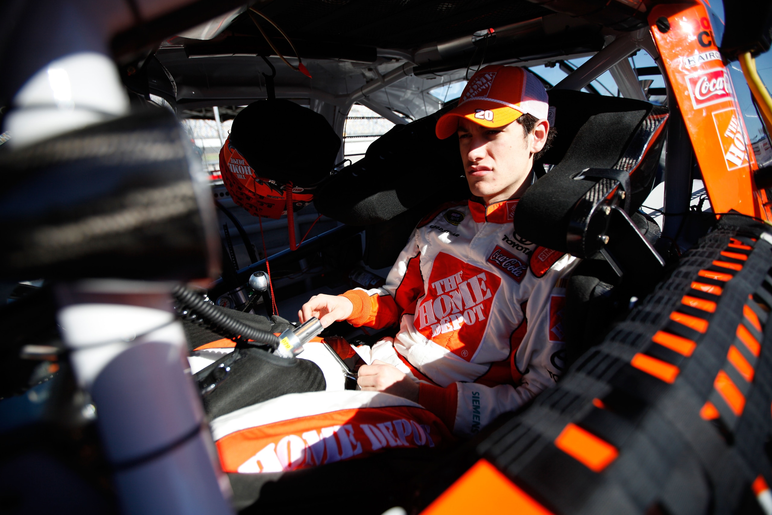 DAYTONA BEACH, FL - FEBRUARY 12: Joey Logano, driver of the #20 Home Depot Toyota, sits in his car during practice for the NASCAR Sprint Cup Series Daytona 500 at Daytona International Speedway on February 12, 2011 in Daytona Beach, Florida. (Photo by C DAYTONA BEACH, FL - FEBRUARY 12: Joey Logano, driver of the #20 Home Depot Toyota, sits in his car during practice for the NASCAR Sprint Cup Series Daytona 500 at Daytona International Speedway on February 12, 2011 in Daytona Beach, Florida. (Photo by C