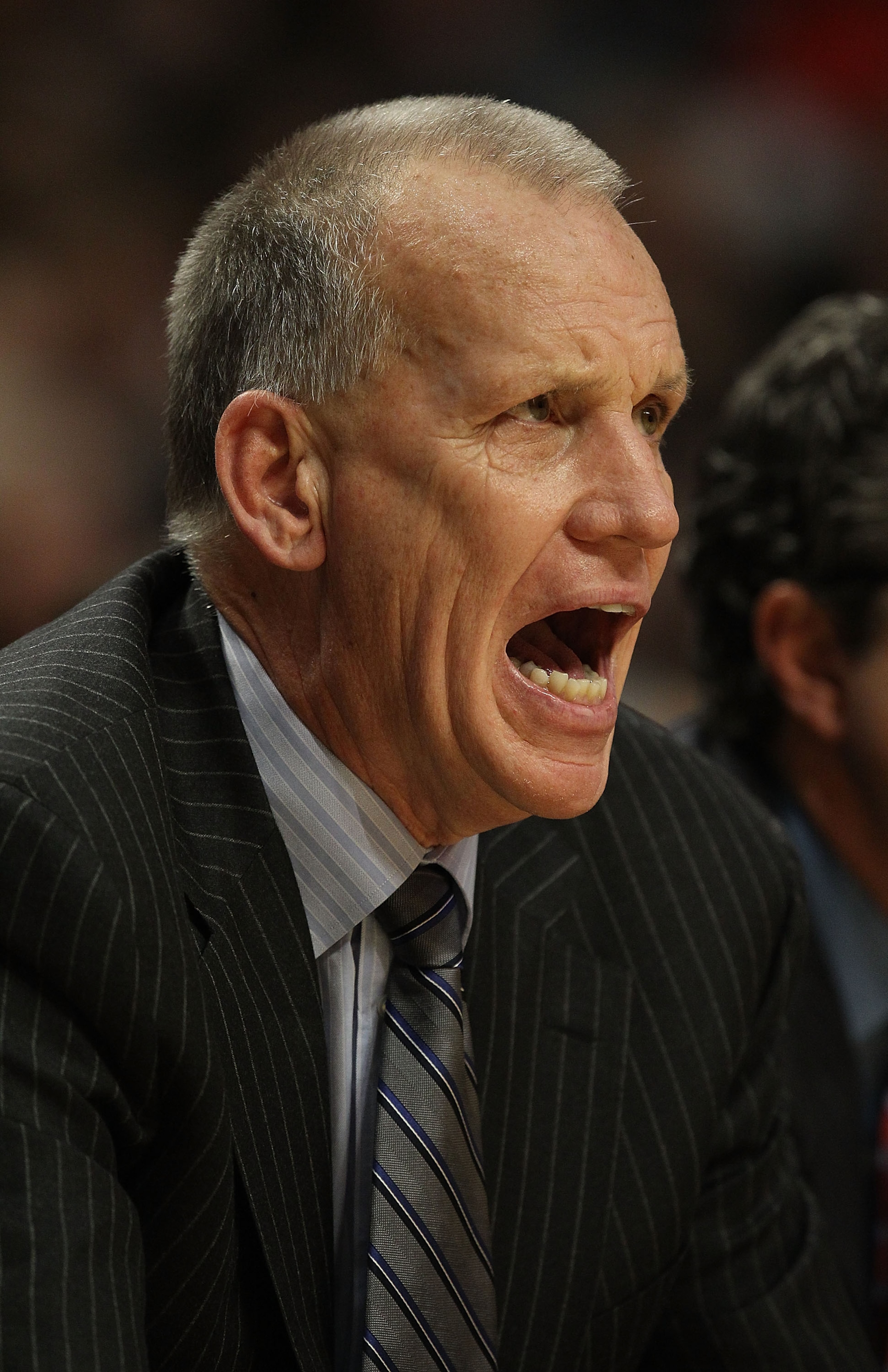 CHICAGO, IL - DECEMBER 21: Head coach Doug Collins of the Philadelphia 76ers gives instructions to his team against the Chicago Bulls at the United Center on December 21, 2010 in Chicago, Illinois. The Bulls defeated the 76ers 121-76. NOTE TO USER: User e