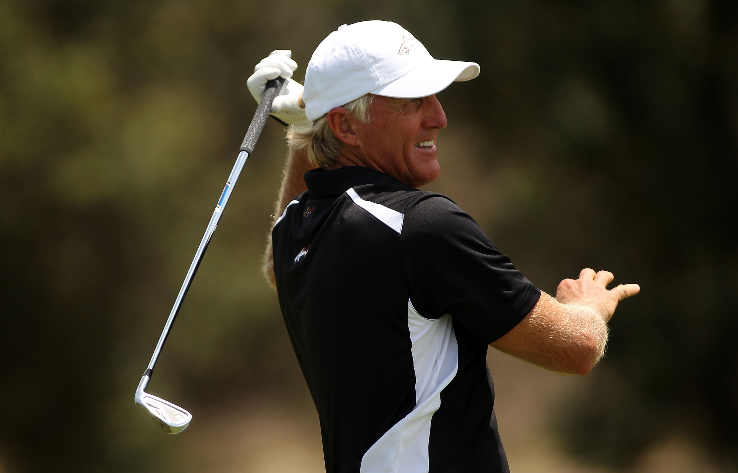 SYDNEY, AUSTRALIA - DECEMBER 05:  Greg Norman  of Australia plays a shot on the 12th hole during day four of the Australian Open at The Lakes Golf Club on December 5, 2010 in Sydney, Australia.  (Photo by Mark Metcalfe/Getty Images)